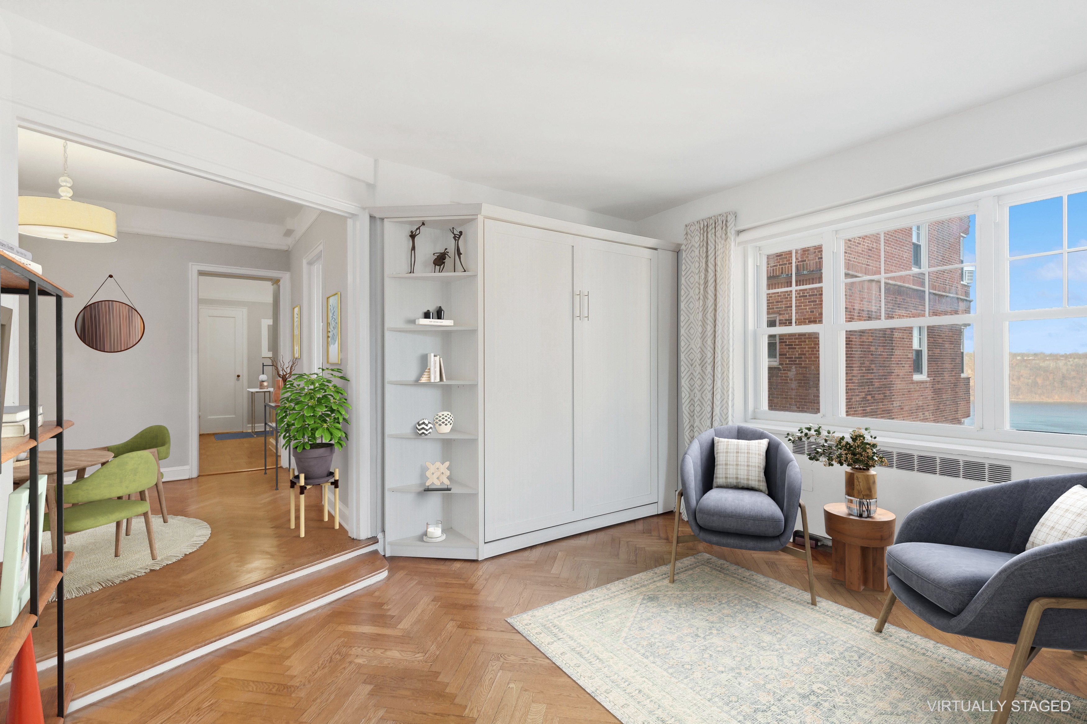 120 Cabrini Boulevard, Unit 107 Manhattan, NY 10033 - Photo 5 of 26 a living room with furniture and a large window