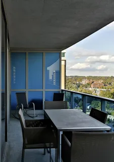 a terrace of a house with outdoor seating