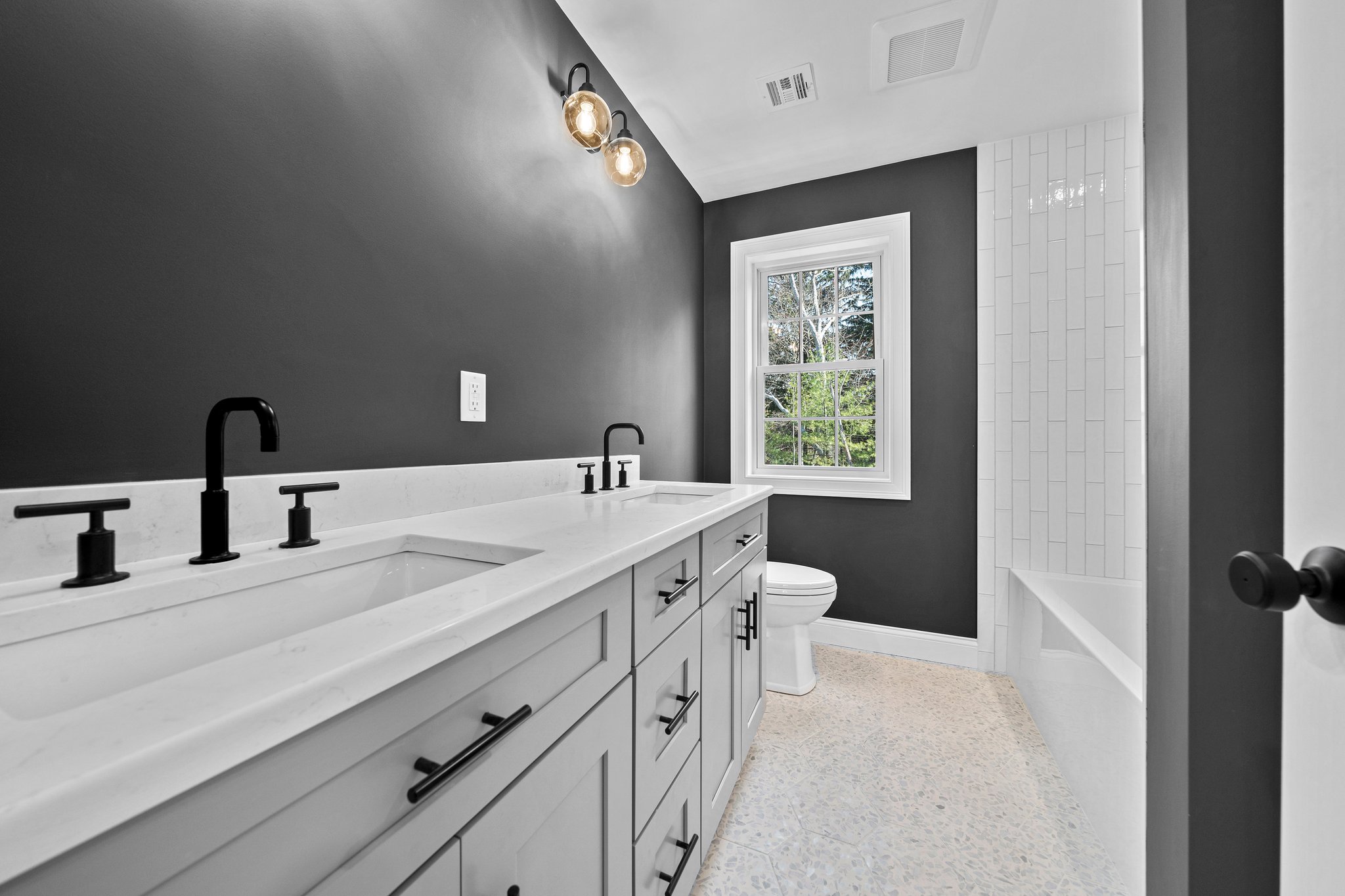 3 Everendon Road Canton, MA 02021 - Photo 26 of 35 a bathroom with a double vanity sink and a window