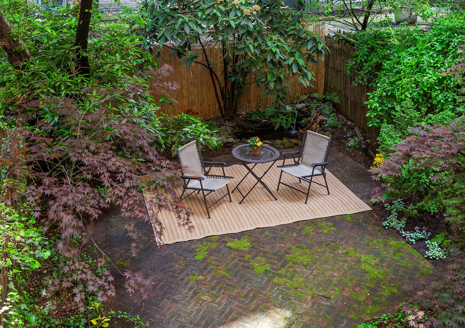 144 West 80th Street Manhattan, NY 10024 - Photo 3 of 22 a view of a backyard with sitting area