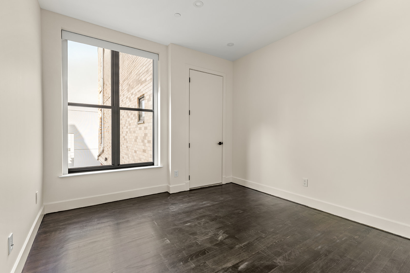 246 Withers Street, Unit 2G Brooklyn, NY 11211 - Photo 5 of 9 an empty room with a window
