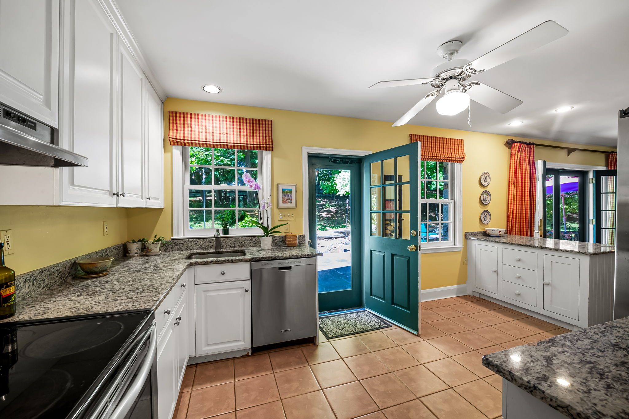 910 Army Road Towson, MD 21204 - Photo 17 of 62 a kitchen with stainless steel appliances granite countertop a sink and a stove