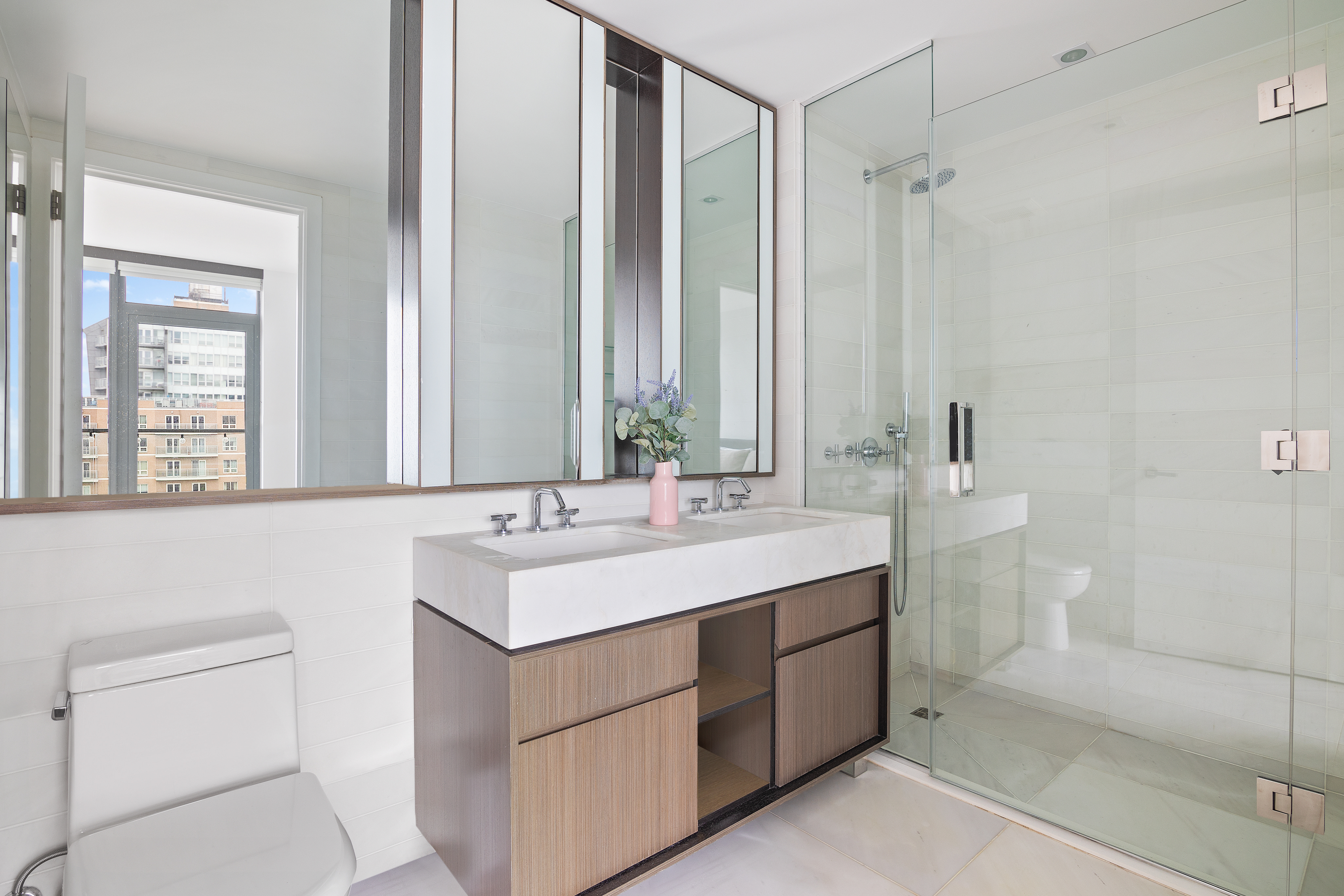251 1st Street, Unit 7F Brooklyn, NY 11215 - Photo 12 of 24 a bathroom with a sink and a toilet