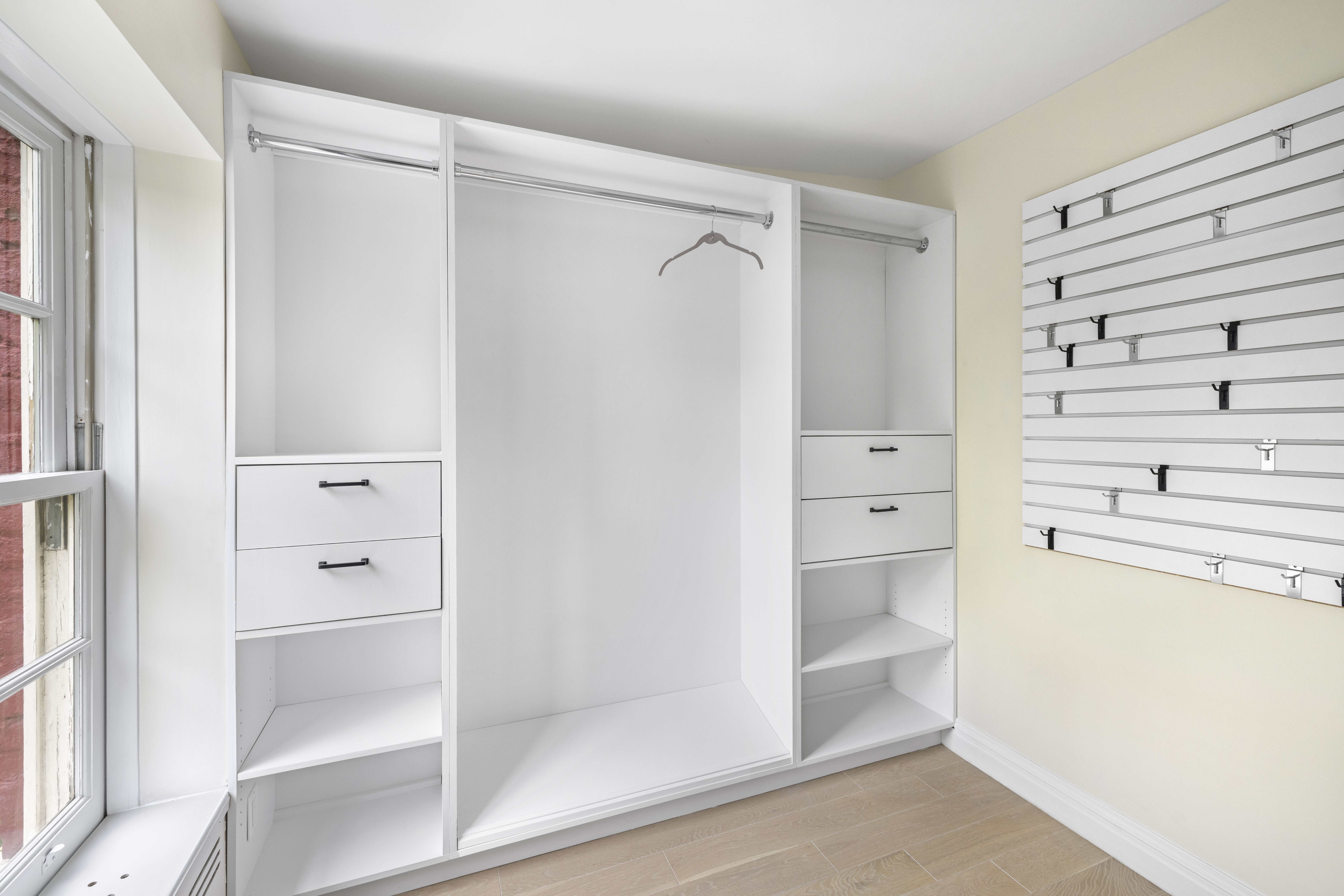 178 Sullivan Street, Unit 2A Manhattan, NY 10012 - Photo 16 of 19 a view of walk in closet and bedroom view