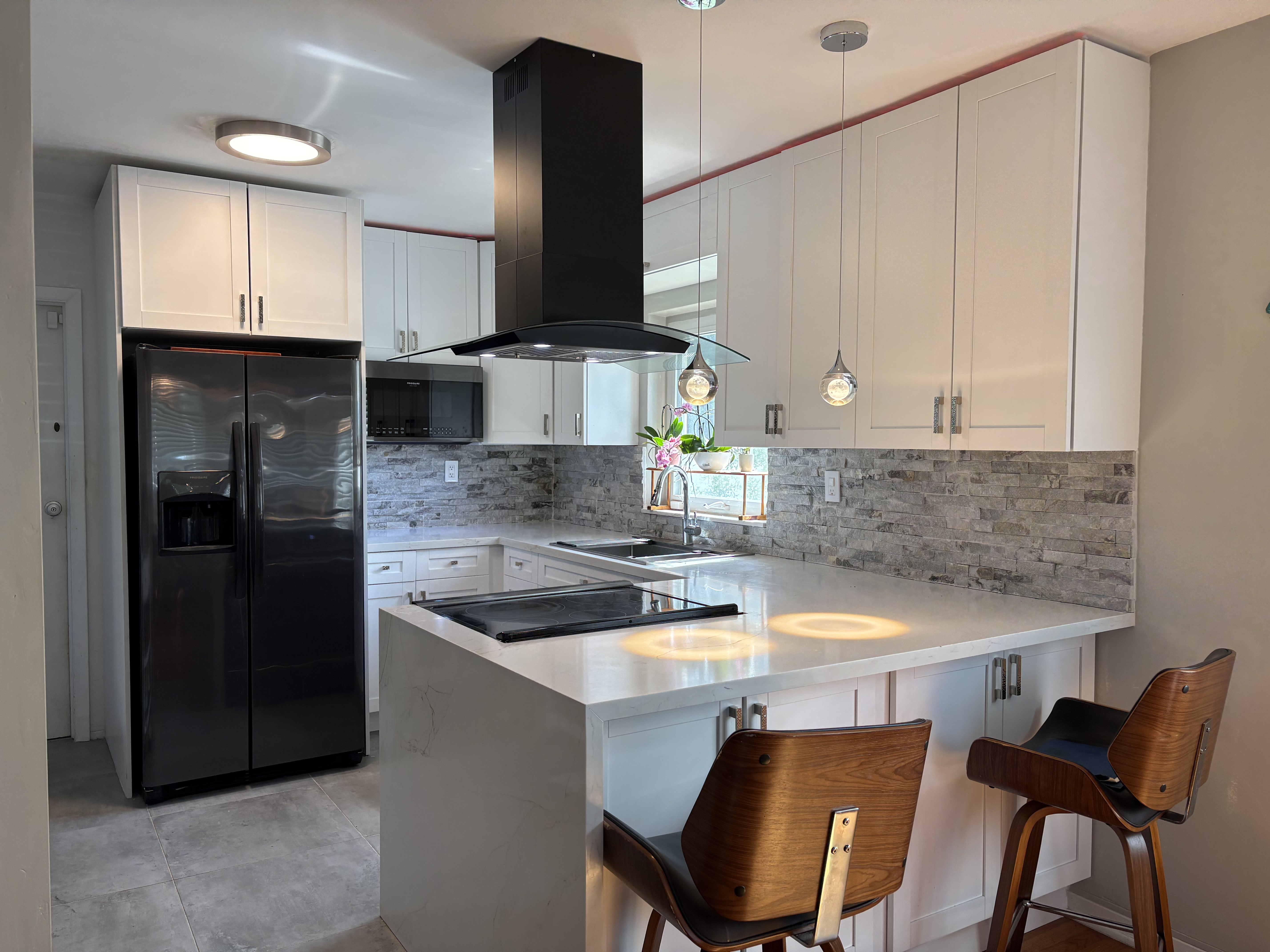 14 Northeast 108th Street Miami, FL 33161 - Photo 4 of 4 a kitchen with a sink cabinets and window