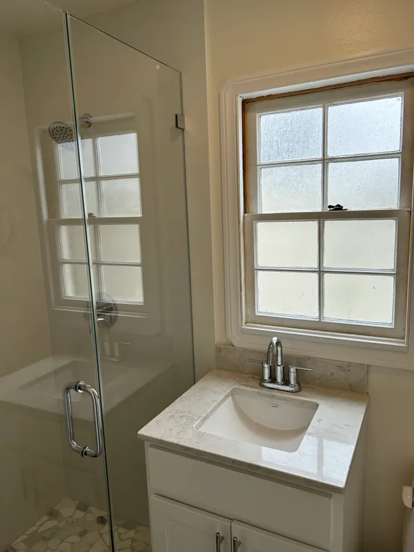 a bathroom with a sink and a vanity
