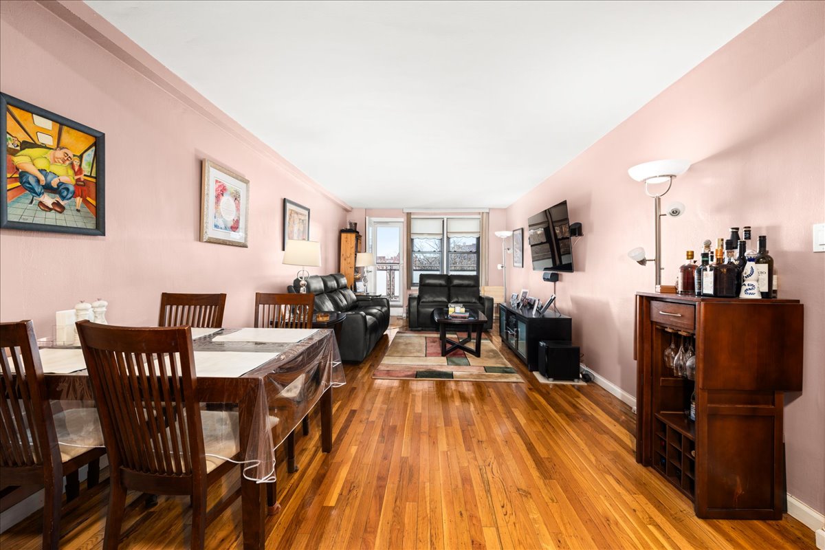 350 Ocean Parkway, Unit 3C Brooklyn, NY 11218 - Photo 2 of 10 a view of a dining room with furniture and wooden floor