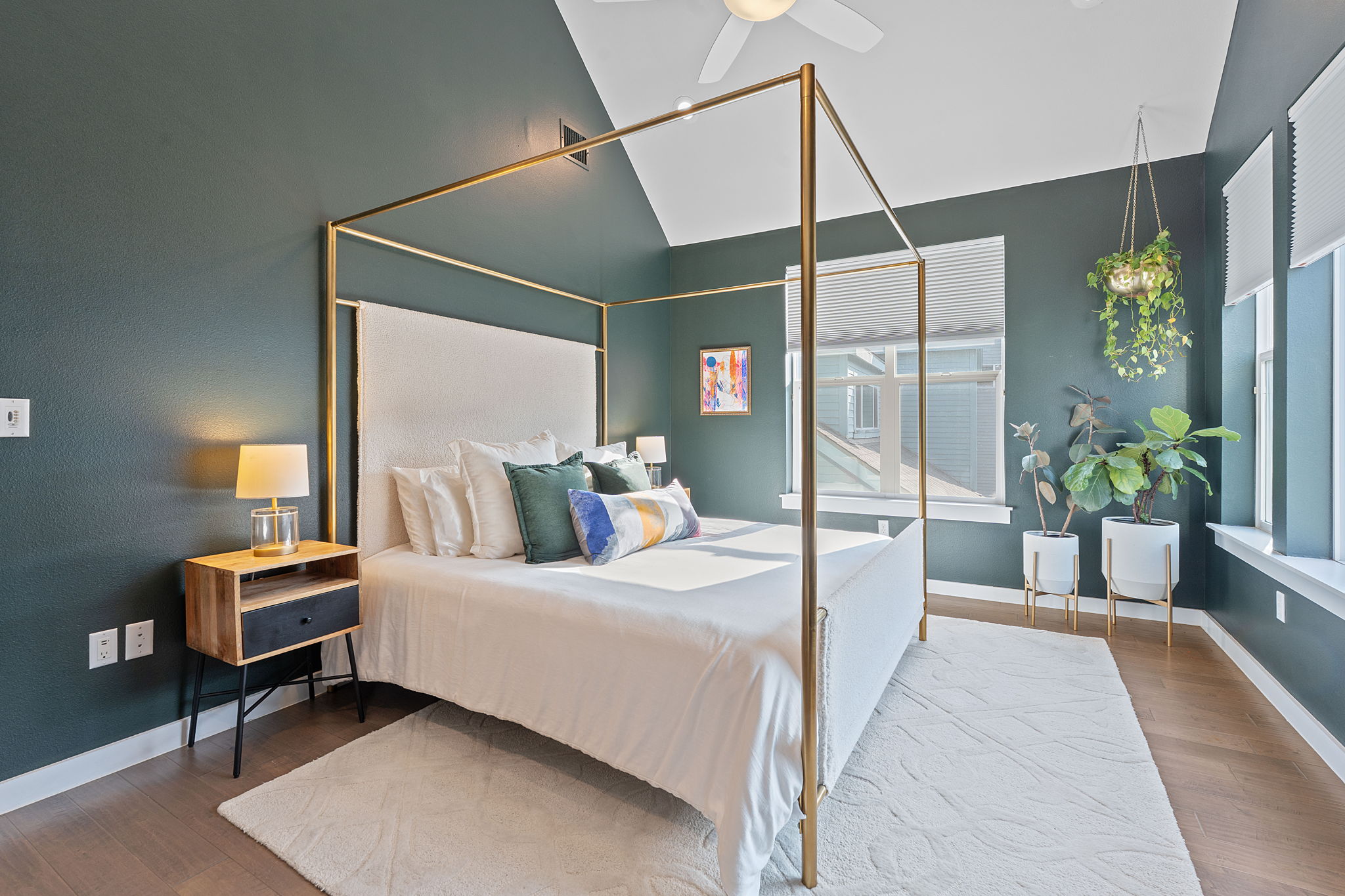 3001 Del Curto Road, Unit 10 Austin, TX 78704 - Photo 17 of 44 a room with a bed and a potted plant