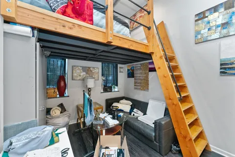 a bathroom with a shower and a toilet