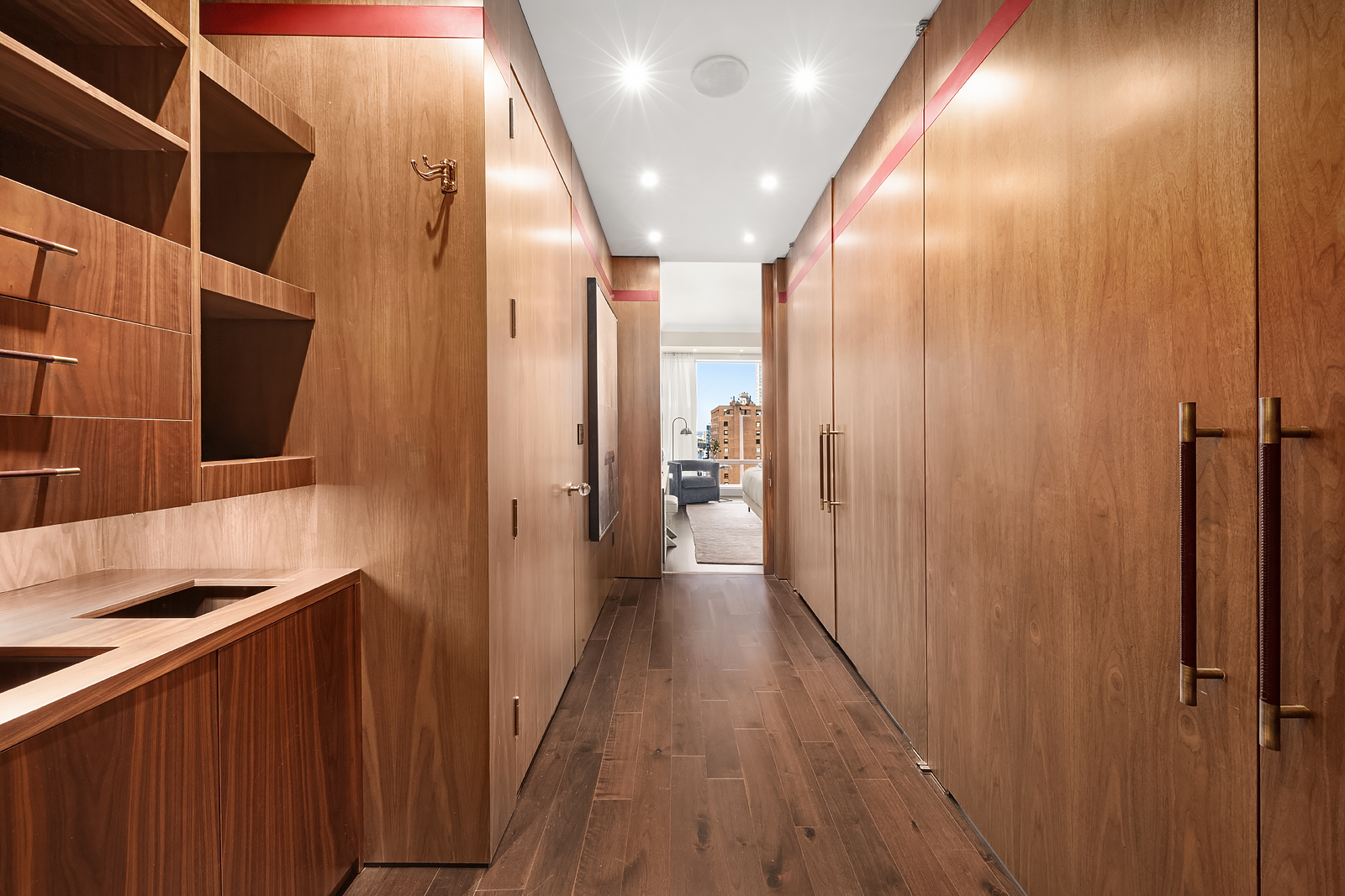 1 Central Park West, Unit 30E Manhattan, NY 10023 - Photo 7 of 12 a view of a hallway with wooden floor and staircase