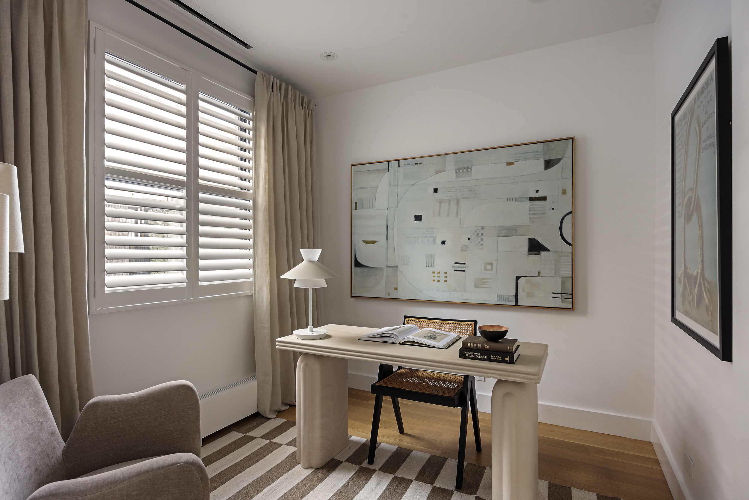 45 Warren Street, Unit PH Manhattan, NY 10007 - Photo 24 of 29 a view of a workspace with furniture and a window