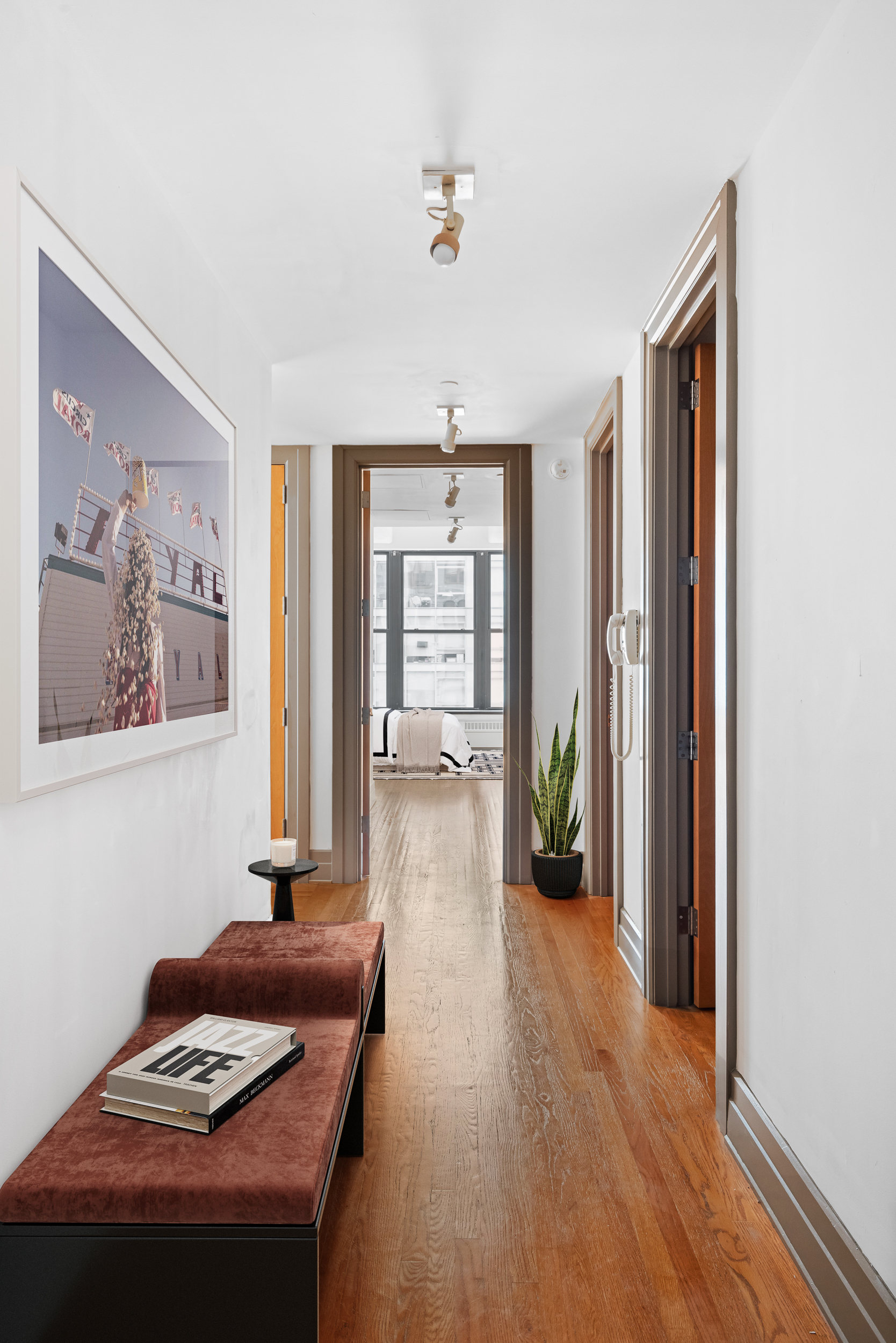 30 Main Street, Unit 10F Brooklyn, NY 11201 - Photo 12 of 16 a living room with furniture and wooden floor