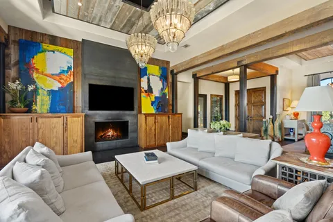 a large kitchen with stainless steel appliances granite countertop a stove and cabinets