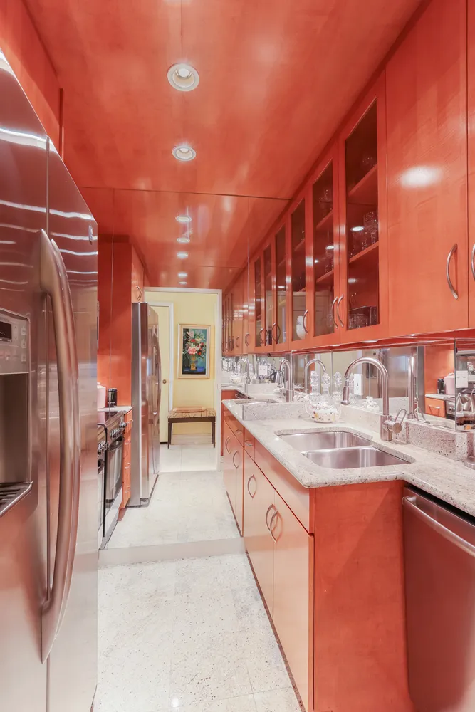 a kitchen with stainless steel appliances granite countertop a sink and cabinets