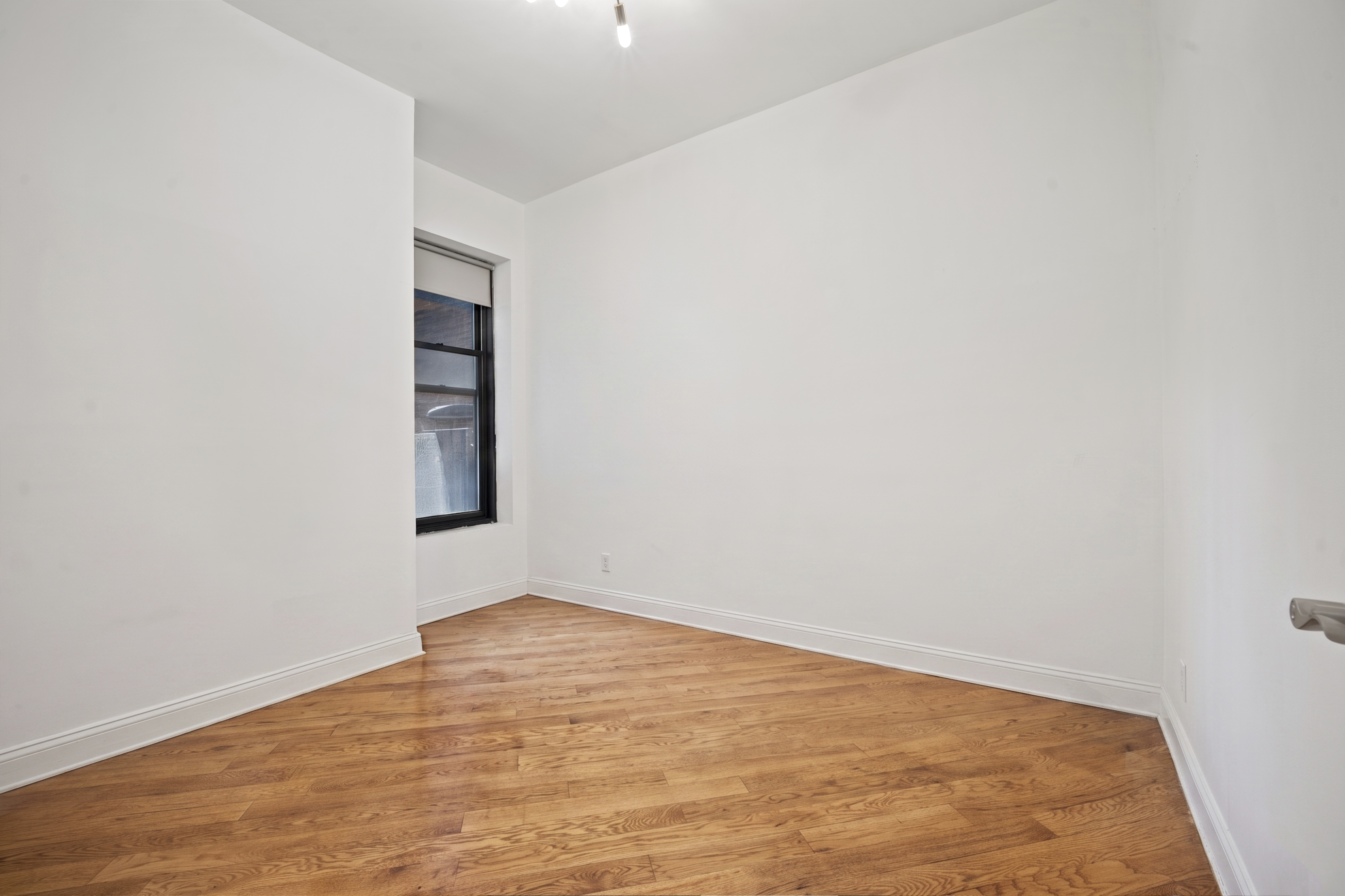 36 West 35th Street, Unit 2A Manhattan, NY 10001 - Photo 9 of 11 a view of empty room