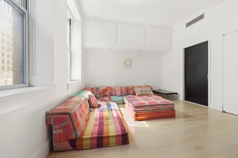 a bathroom with a bathtub and a sink