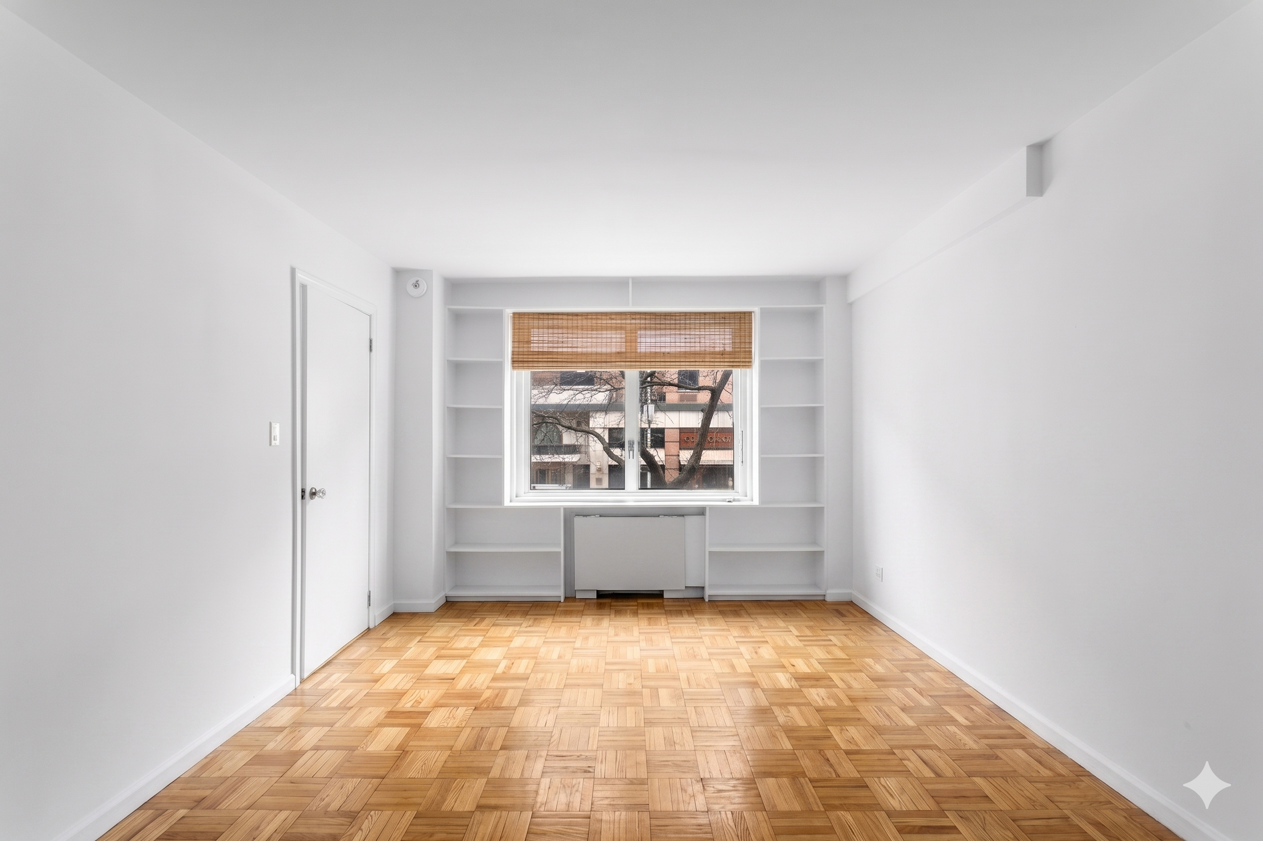 201 East 25th Street, Unit 2FG Manhattan, NY 10010 - Photo 6 of 16 an empty room with windows