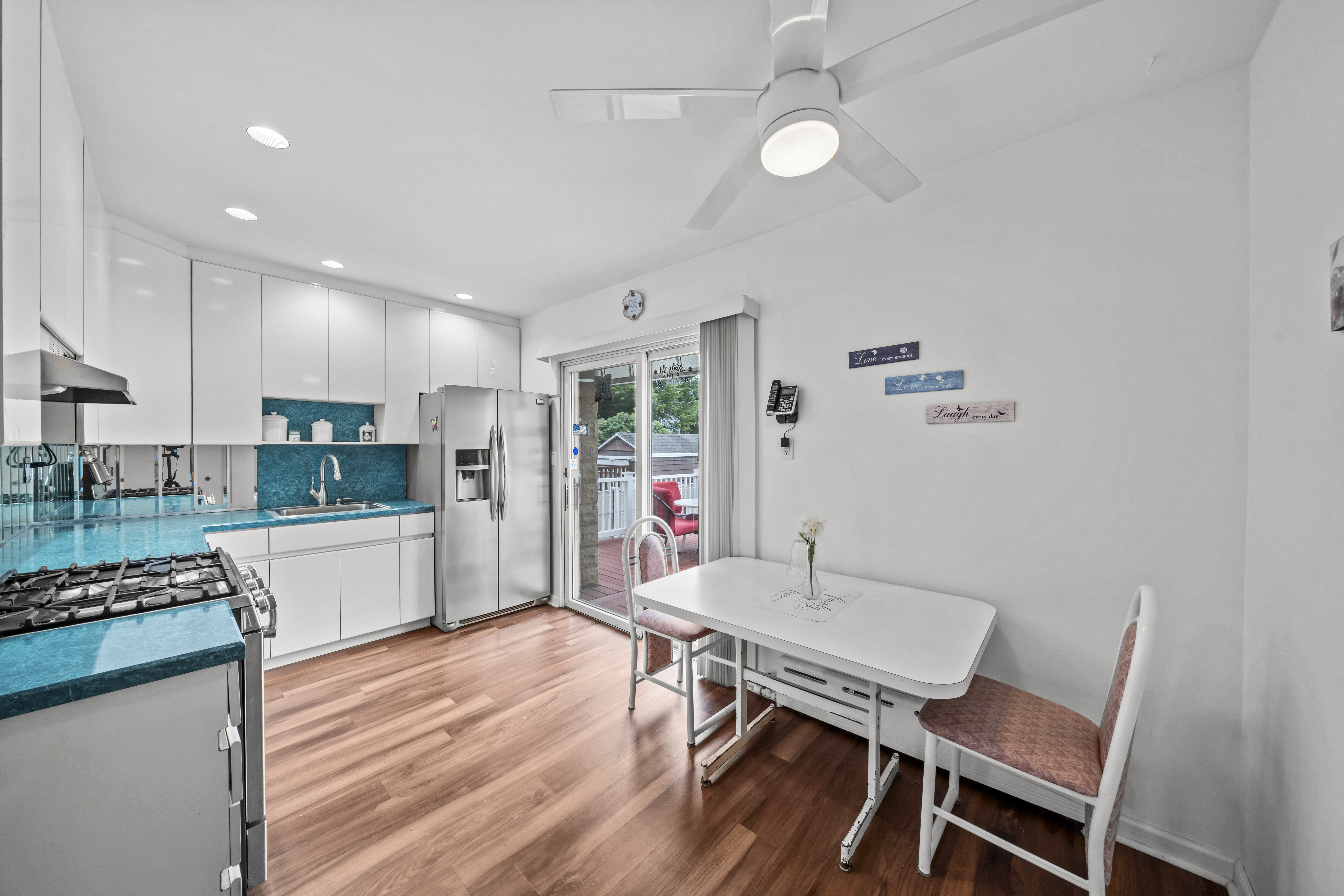 2018 Mill Avenue Brooklyn, NY 11234 - Photo 11 of 20 a kitchen with a table and chairs