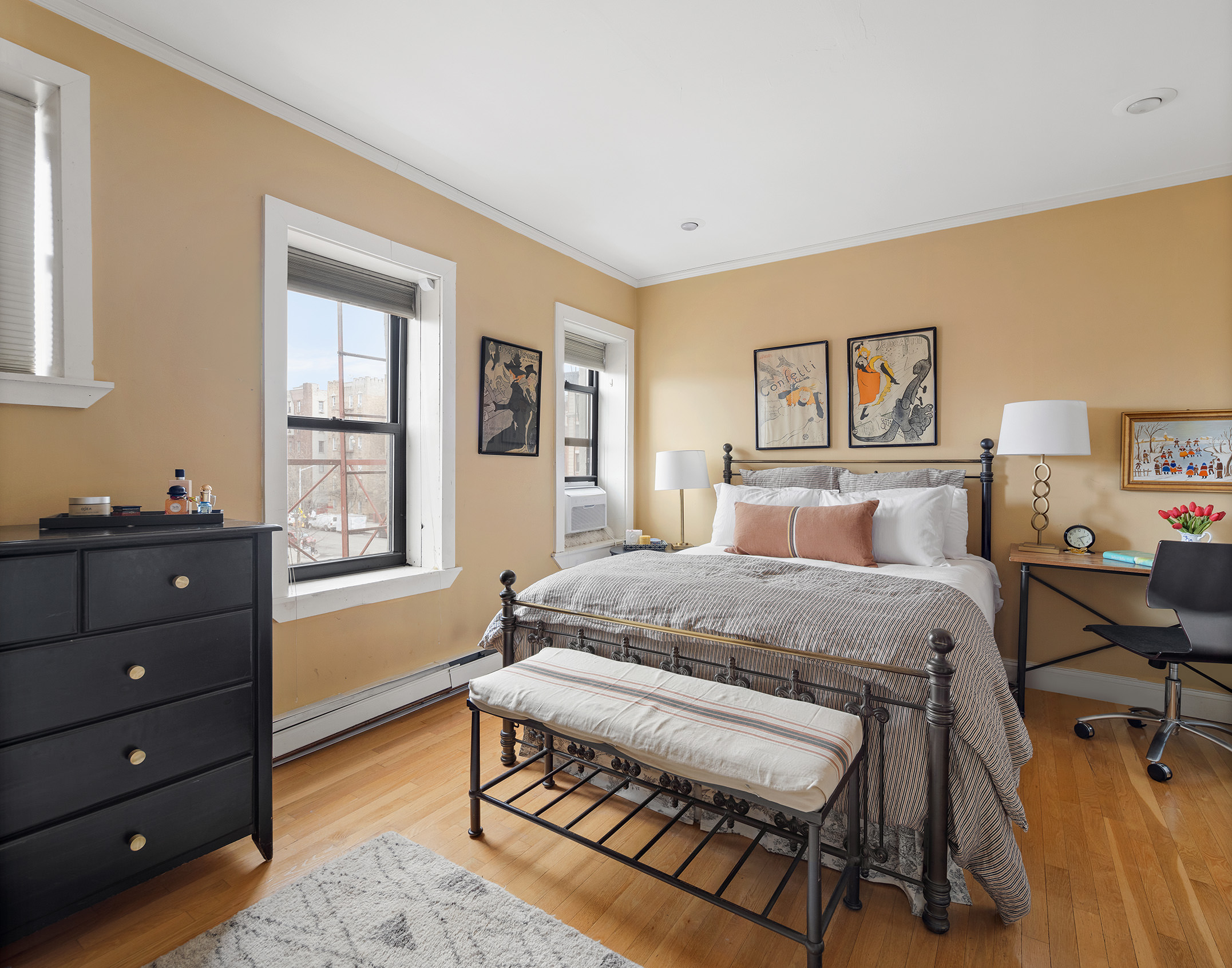 657 West 183rd Street Manhattan, NY 10033 - Photo 14 of 22 a bedroom with a bed and a window