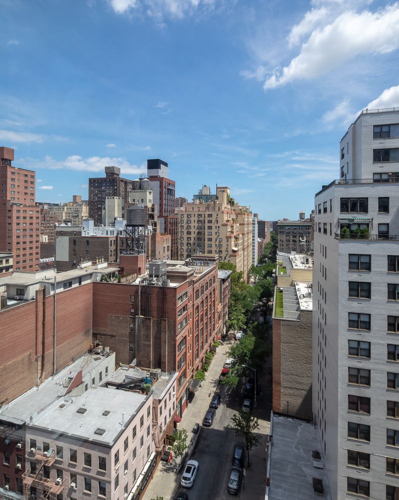 160 East 22nd Street, Unit 15C Manhattan, NY 10010 - Photo 5 of 6 a city view with tall buildings