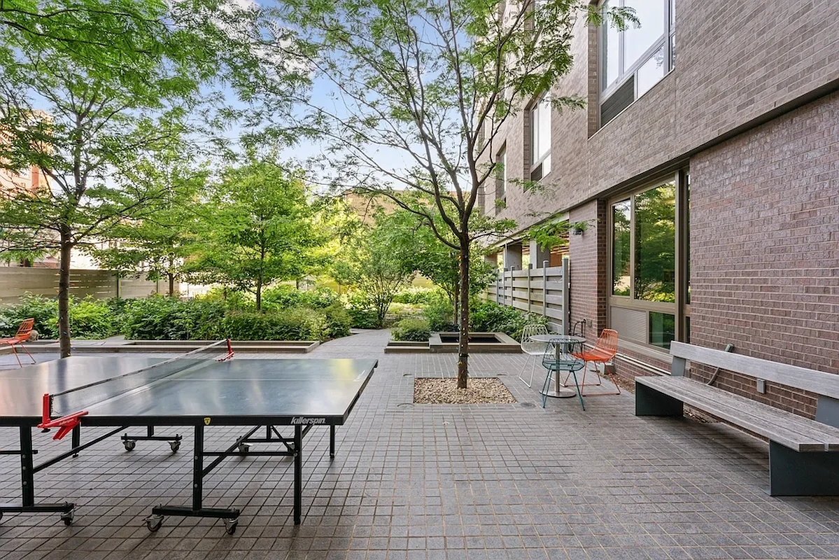 626 Flatbush Avenue, Unit 12D Brooklyn, NY 11225 - Photo 11 of 18 a view of a patio with table and chairs and potted plants