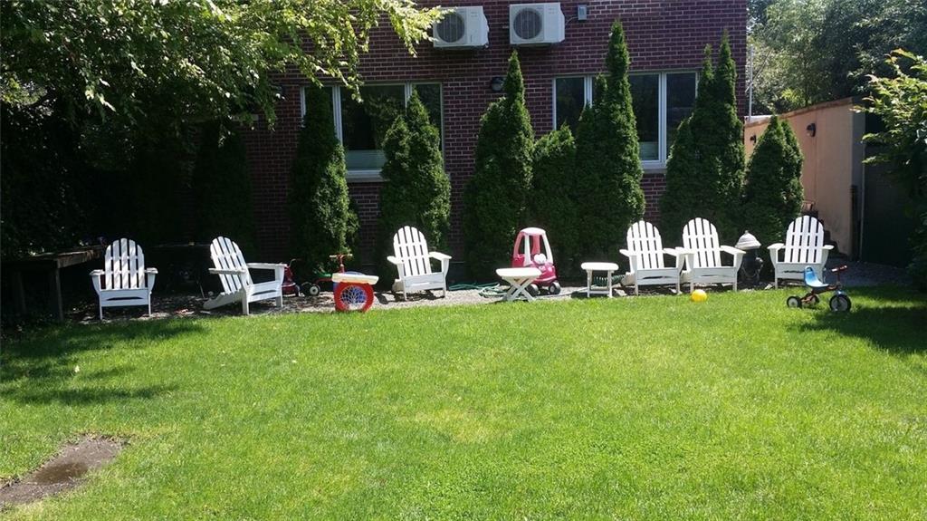 1638 8th Avenue, Unit 1B Brooklyn, NY 11215 - Photo 10 of 12 a front view of a house with garden and sitting area