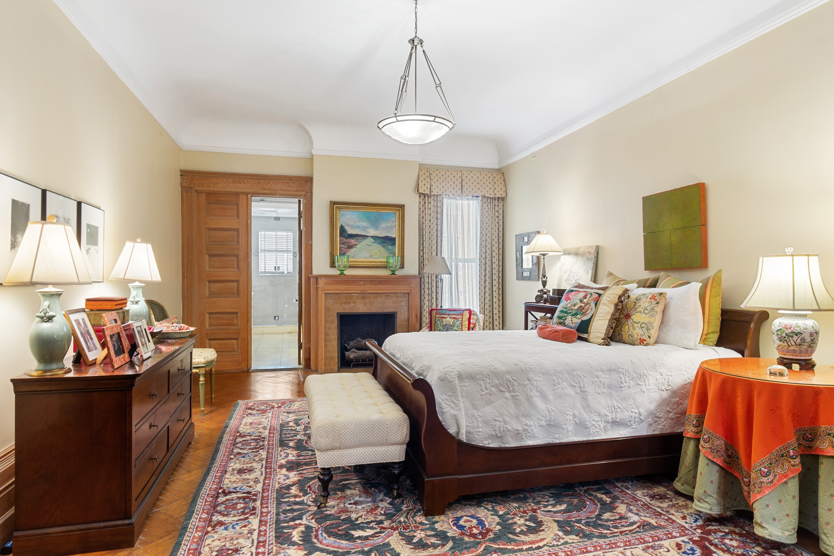 333 West 71st Street Manhattan, NY 10023 - Photo 10 of 29 a living room with furniture and a fireplace