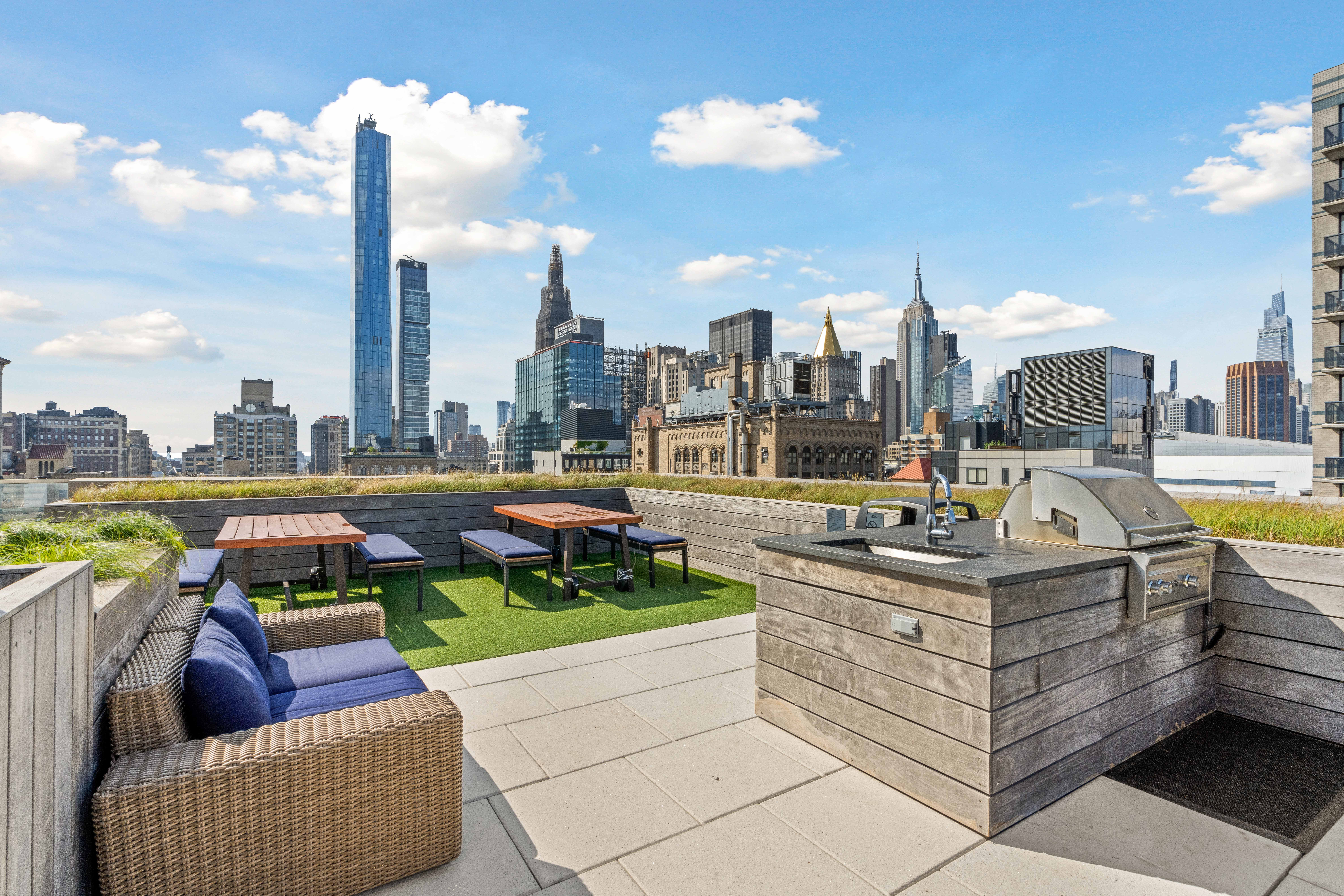 160 East 22nd Street, Unit 9E Manhattan, NY 10010 - Photo 12 of 17 a view of a swimming pool and chairs in the patio