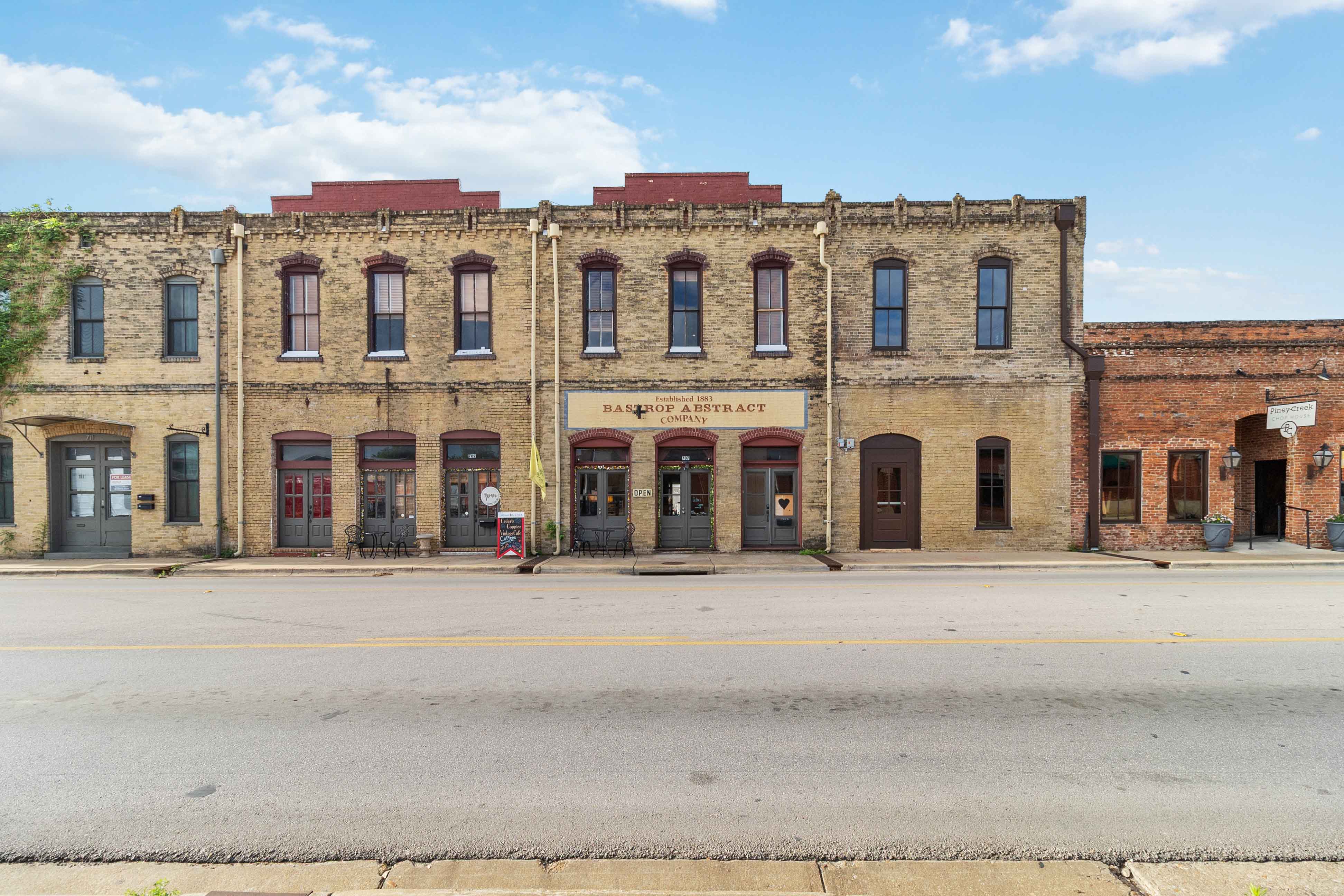 709 Chestnut Street Bastrop, TX 78602 - Photo 1 of 45 a front view of a building
