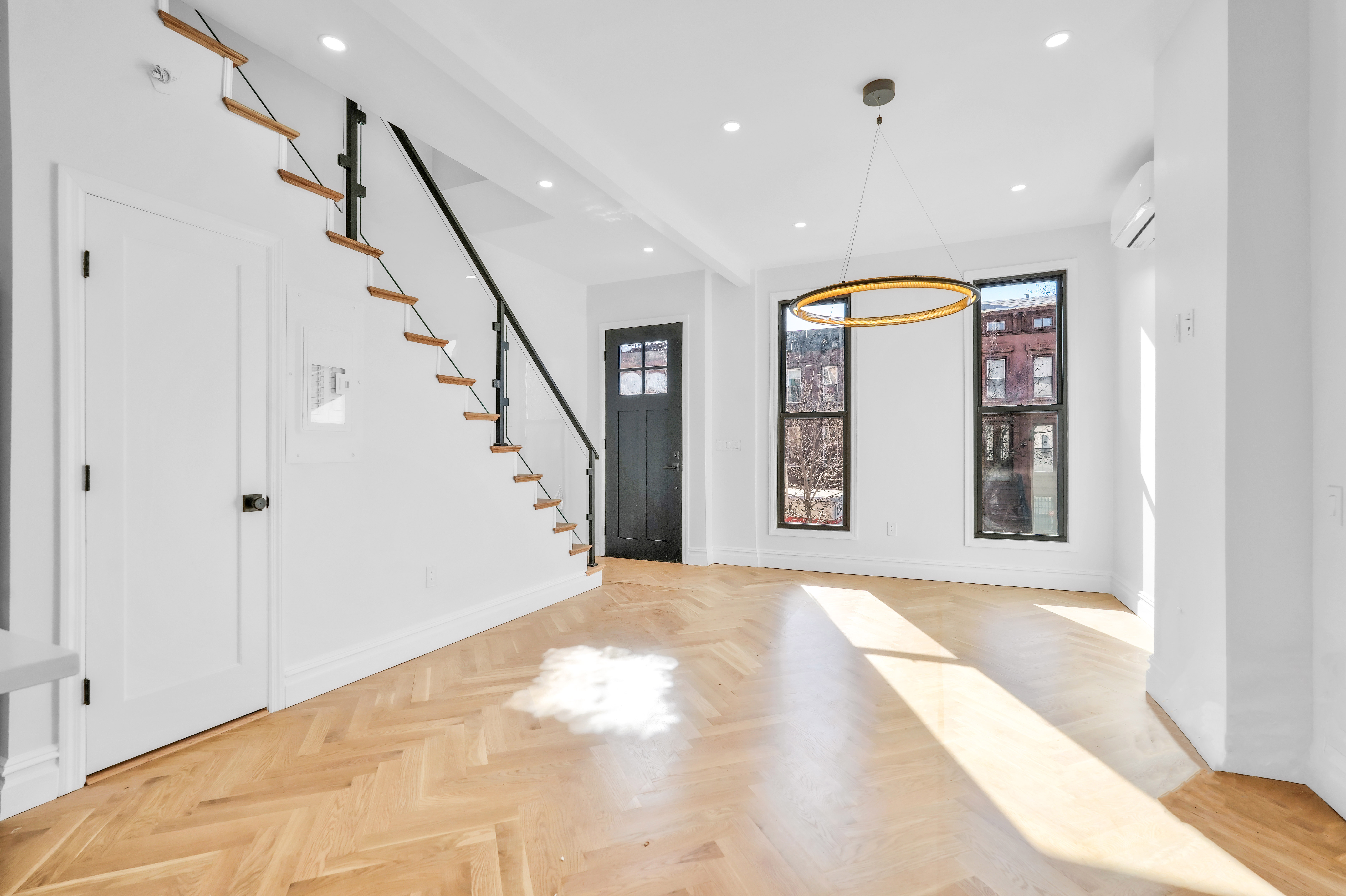 473 Monroe Street Brooklyn, NY 11221 - Photo 13 of 40 a view of an entryway with staircase