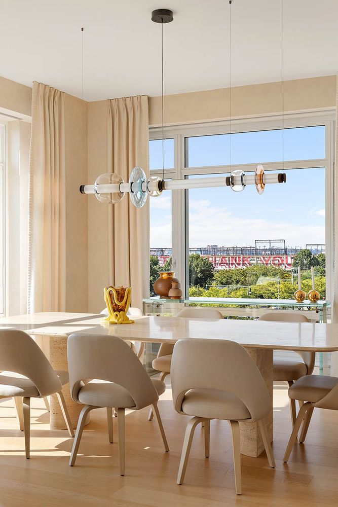 a very nice looking dining room with a table and chairs