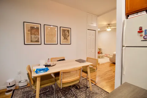 a view of a dining room with furniture