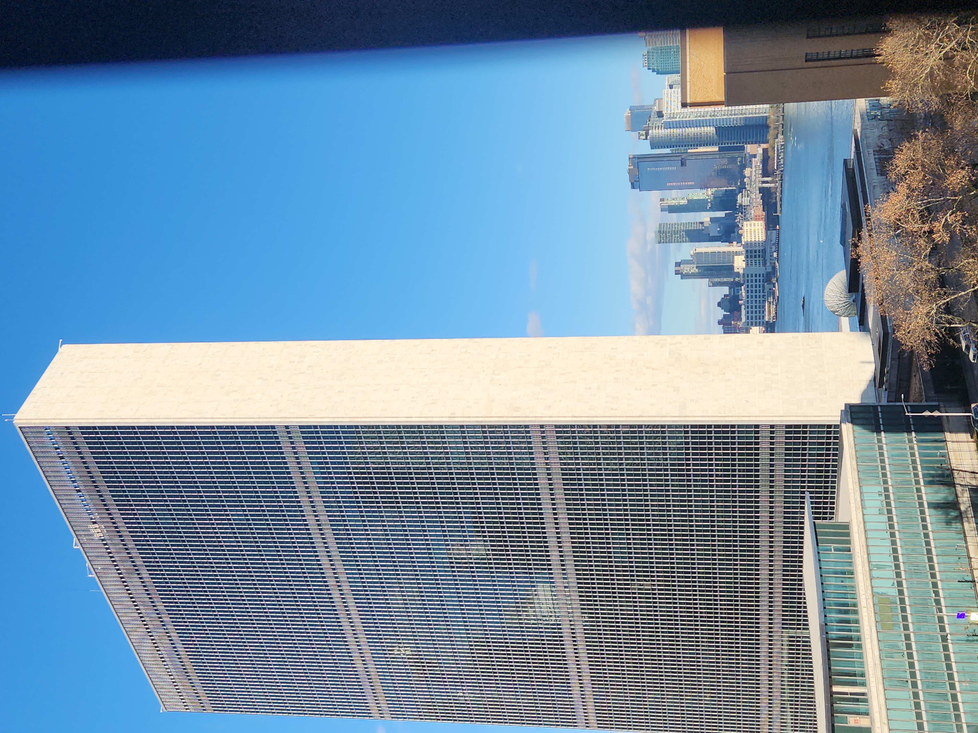 5 Tudor City Place, Unit 602 Manhattan, NY 10017 - Photo 9 of 20 a view of roof with tall building