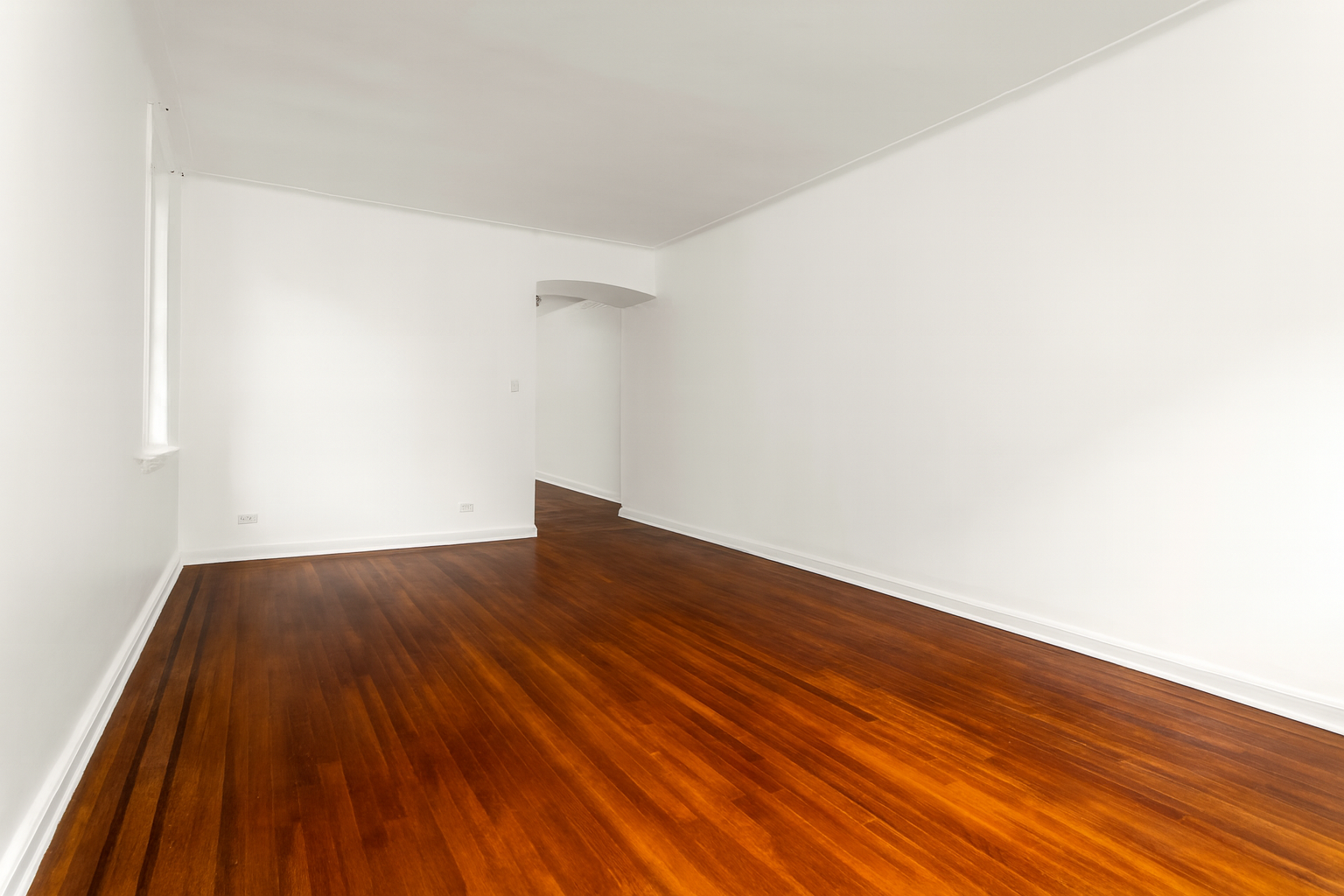 310 West 55th Street, Unit 4K Manhattan, NY 10019 - Photo 4 of 9 a view of wooden floor in a room