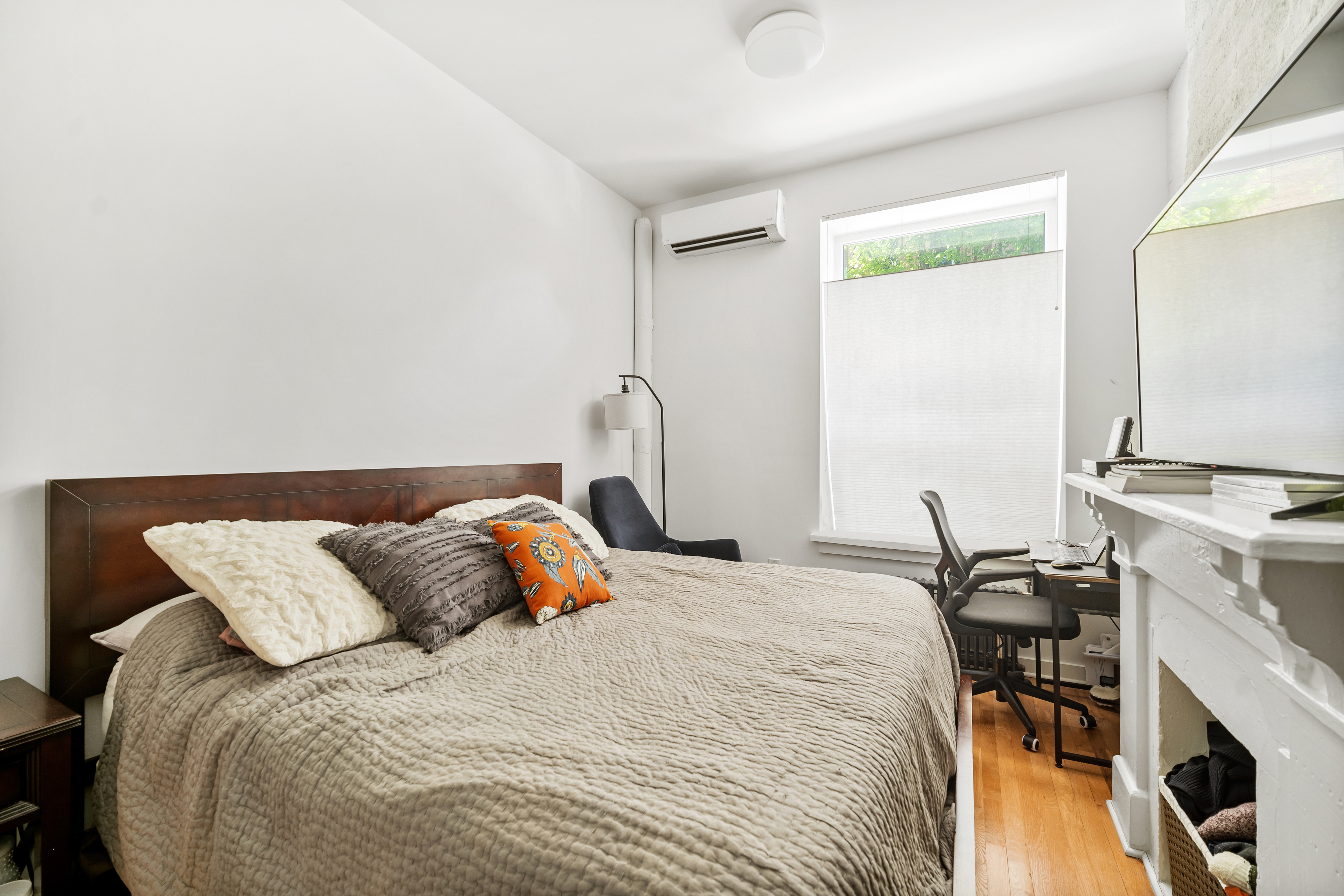 353 12th Street, Unit 2 Brooklyn, NY 11215 - Photo 8 of 17 a bedroom with a bed and a table