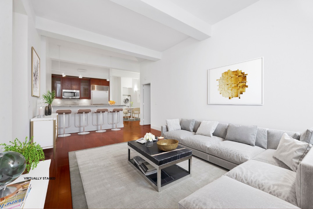 80 John Street, Unit 4C Manhattan, NY 10038 - Photo 2 of 11 a living room with furniture and a flat screen tv