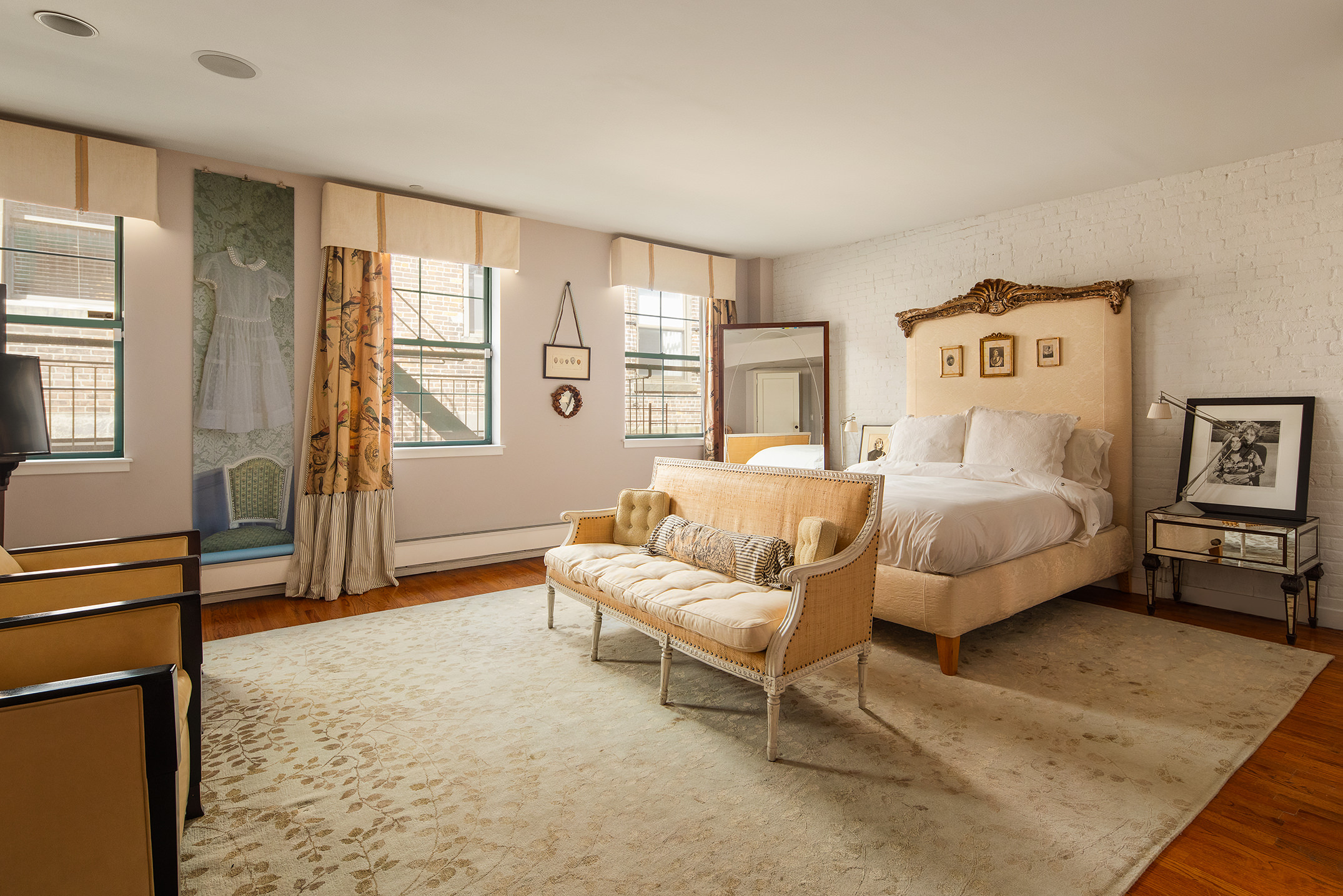 152 Franklin Street, Unit PH Manhattan, NY 10013 - Photo 9 of 17 a spacious bedroom with a bed and wooden floor