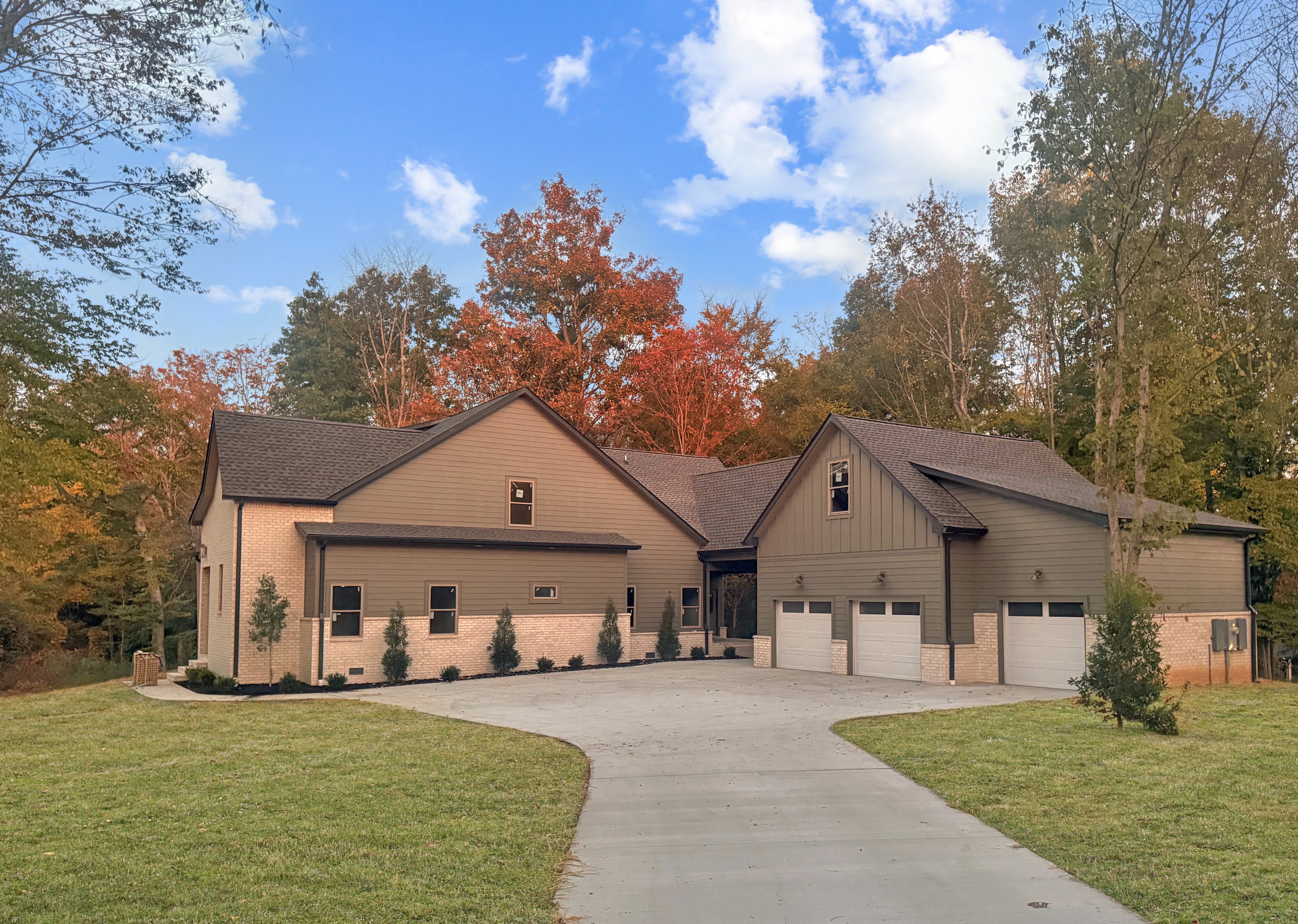 2949 Pace Road Clarksville, TN 37043 - Photo 1 of 18 a view of a white house next to a yard with big trees and plants