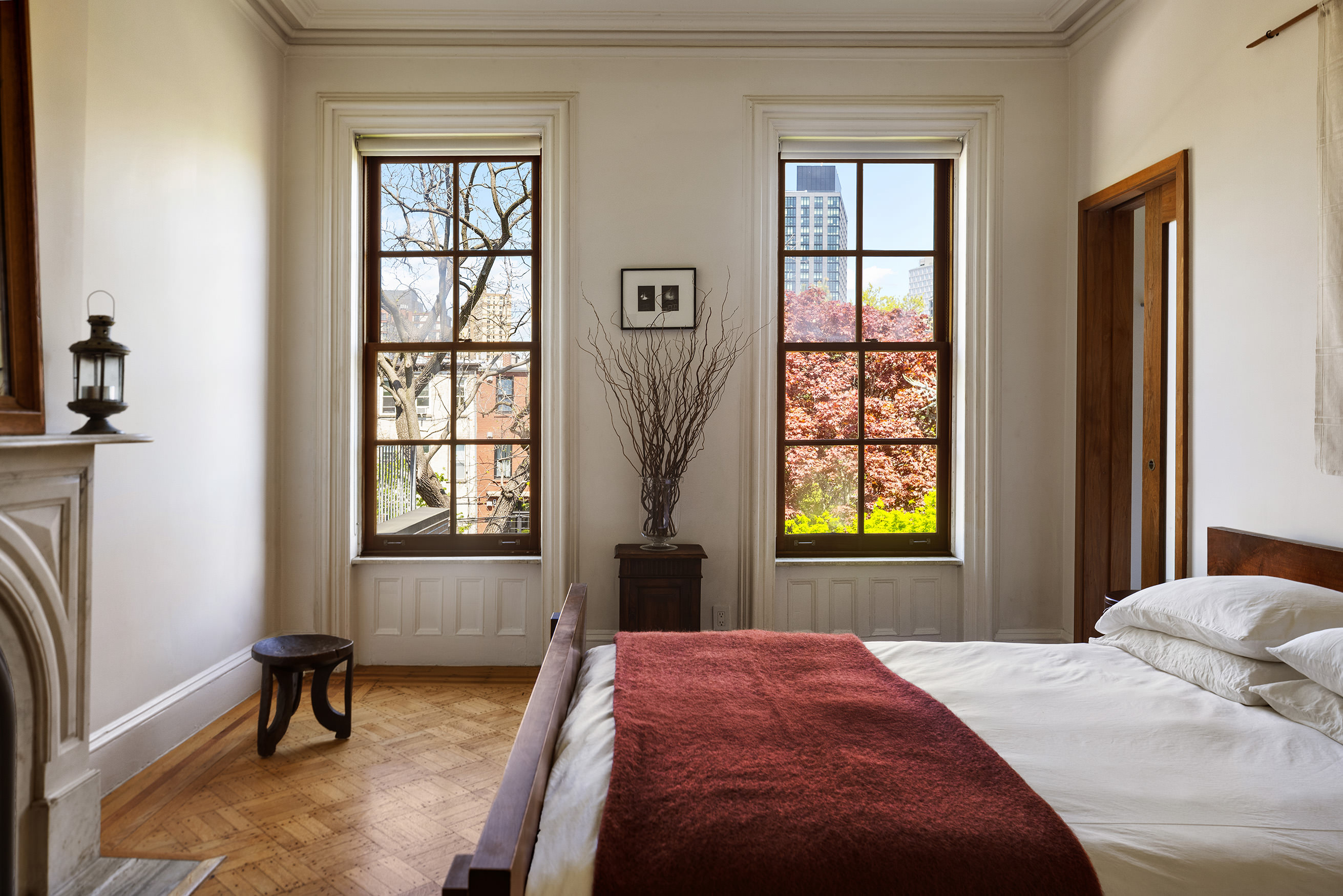 177 Prospect Place Brooklyn, NY 11238 - Photo 22 of 42 a bedroom with a bed and a window with chair