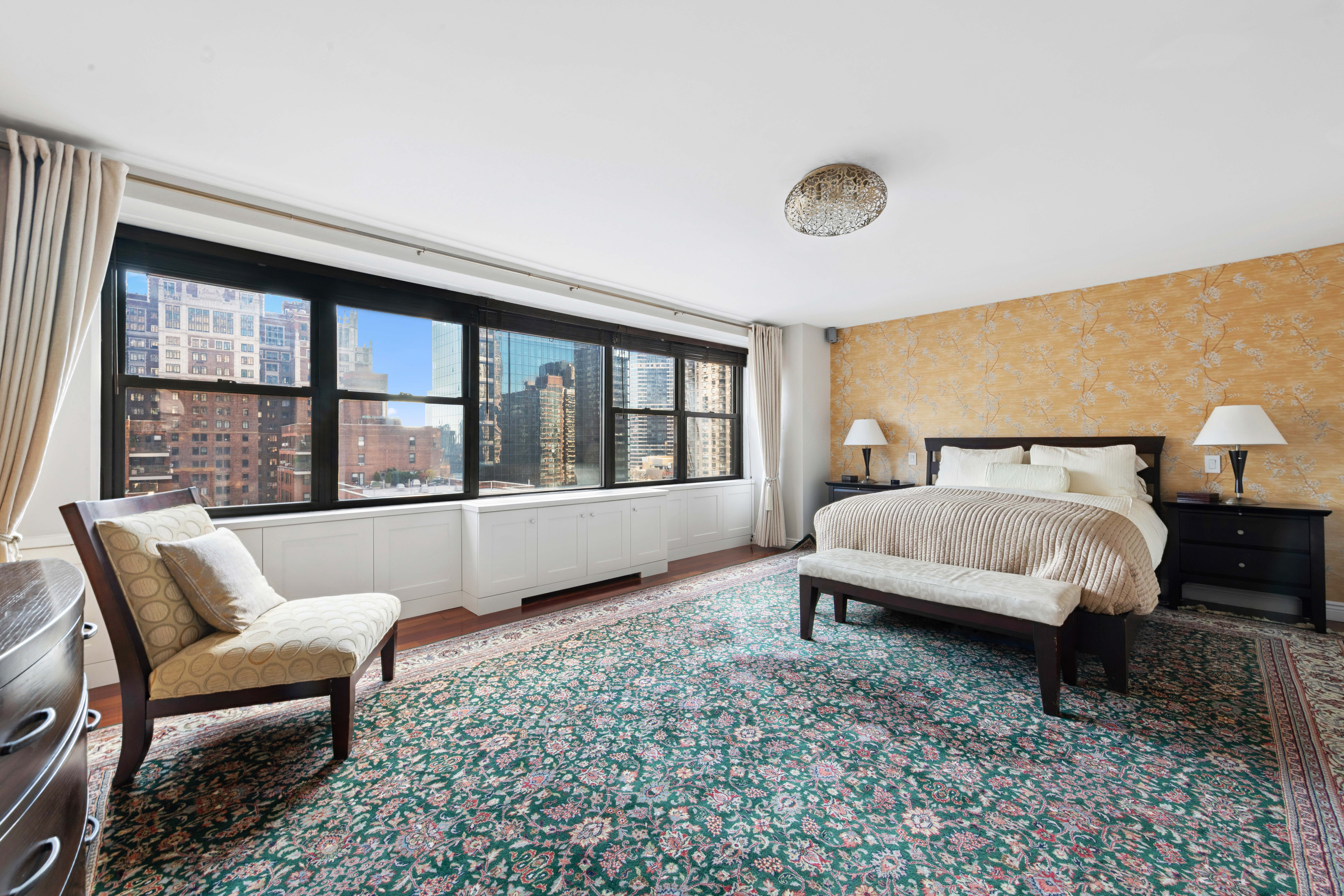 305 East 40th Street, Unit 19CD Manhattan, NY 10016 - Photo 7 of 16 a spacious bedroom with a bed and a window