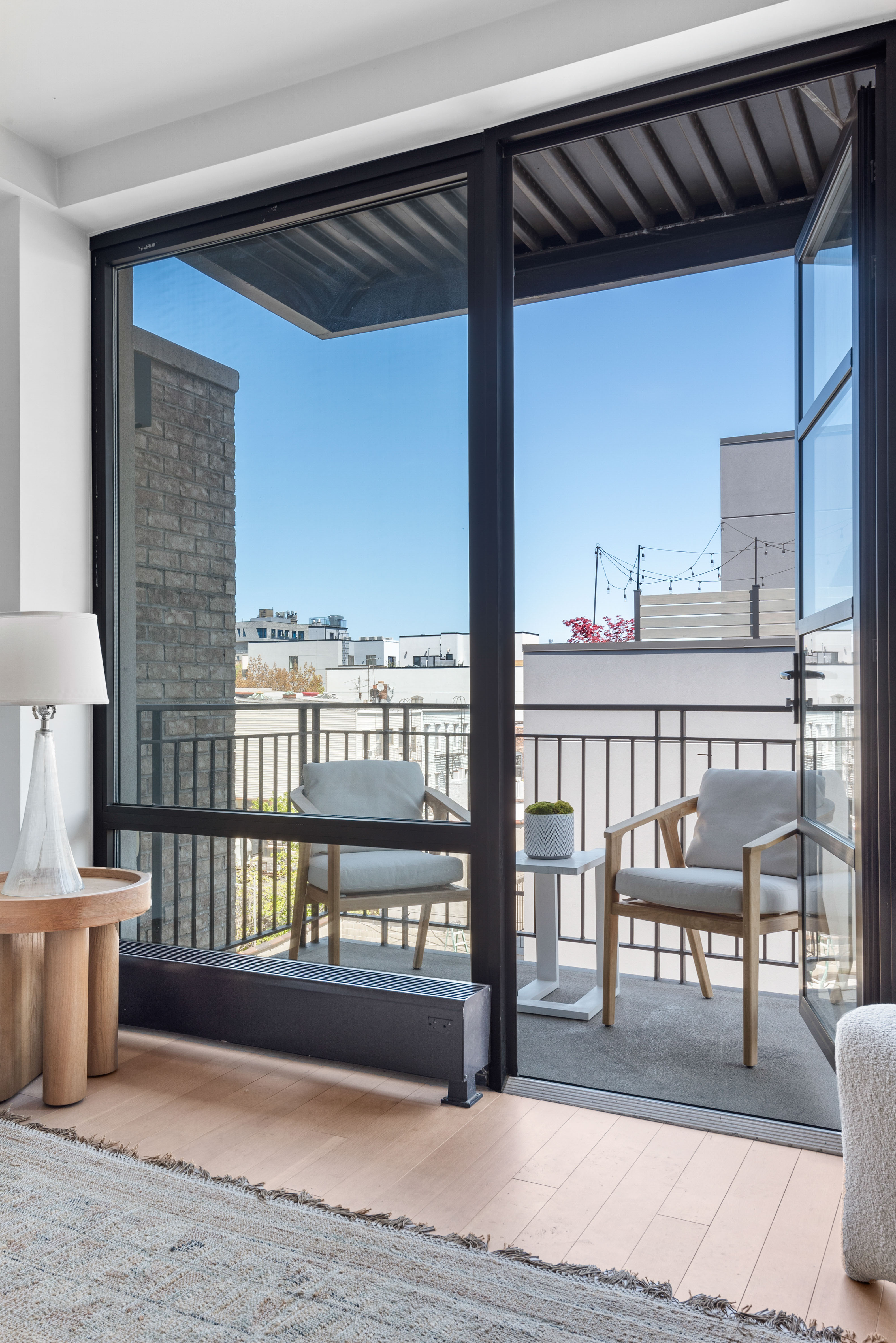 476 Union Avenue, Unit PH5A Brooklyn, NY 11211 - Photo 4 of 17 a view of a living room and a window