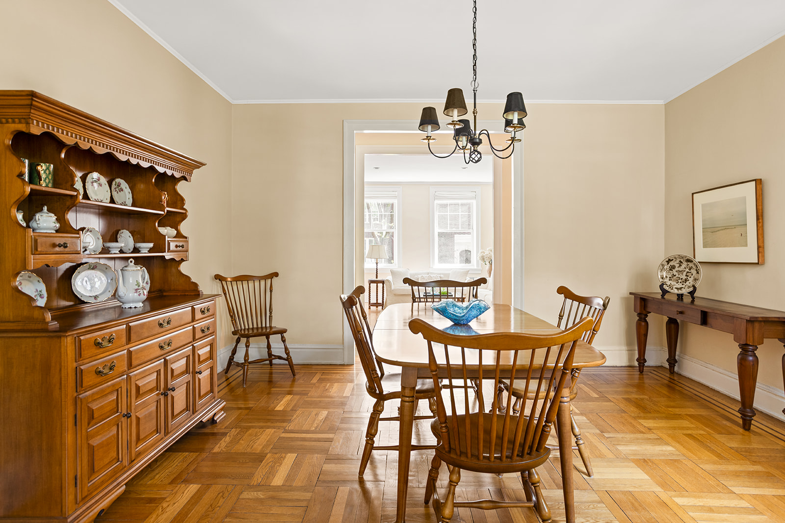 34-28 80th Street, Unit 2 Queens, NY 11372 - Photo 3 of 12 a view of a dining room with furniture and chandelier