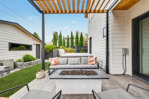 a outdoor living space with furniture and garden