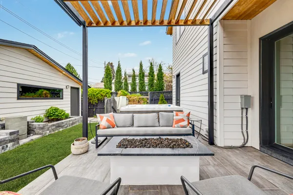 a outdoor living space with furniture and garden