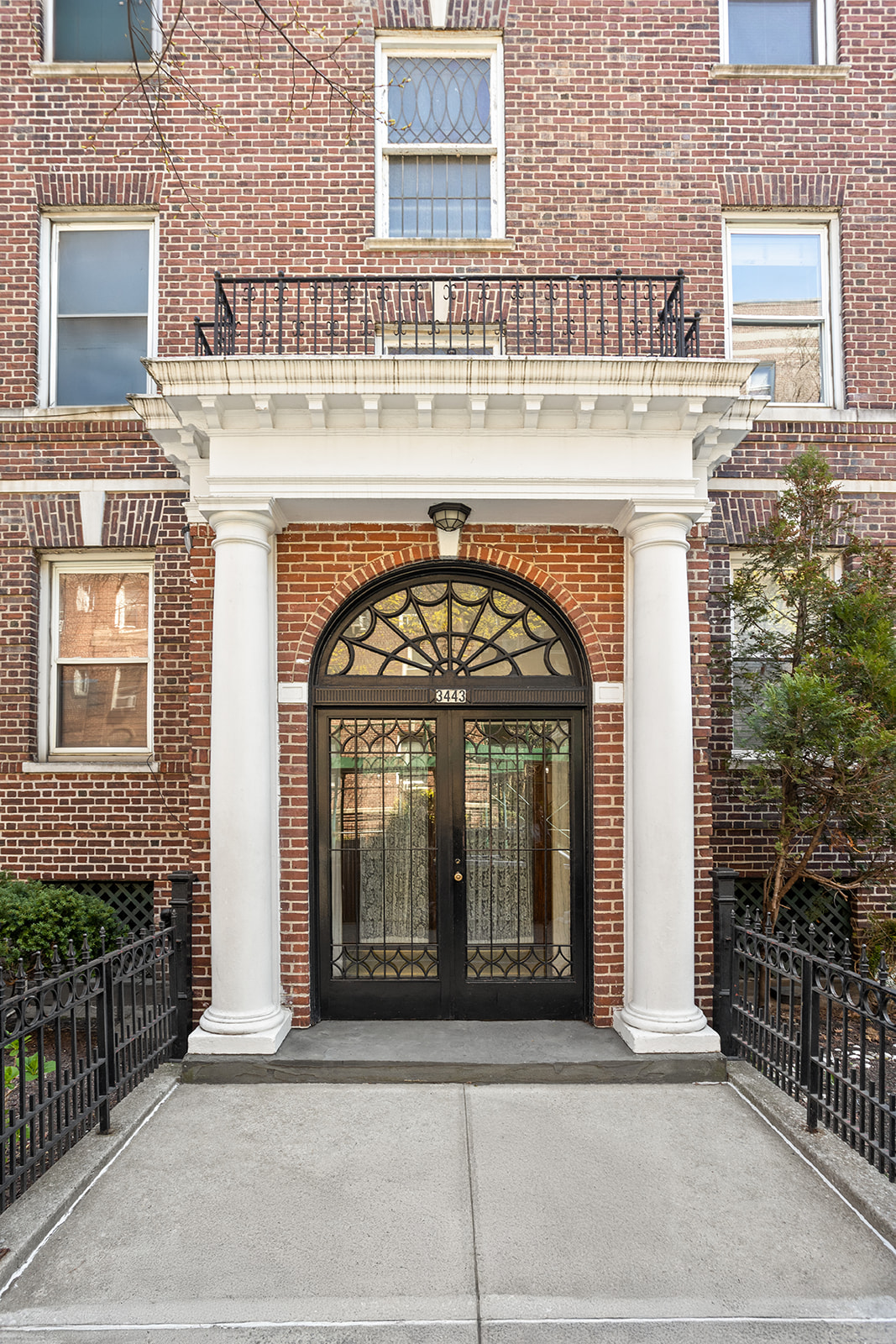 34-43 82nd Street, Unit 22 Queens, NY 11372 - Photo 9 of 11 a living room with a fireplace windows and a fireplace