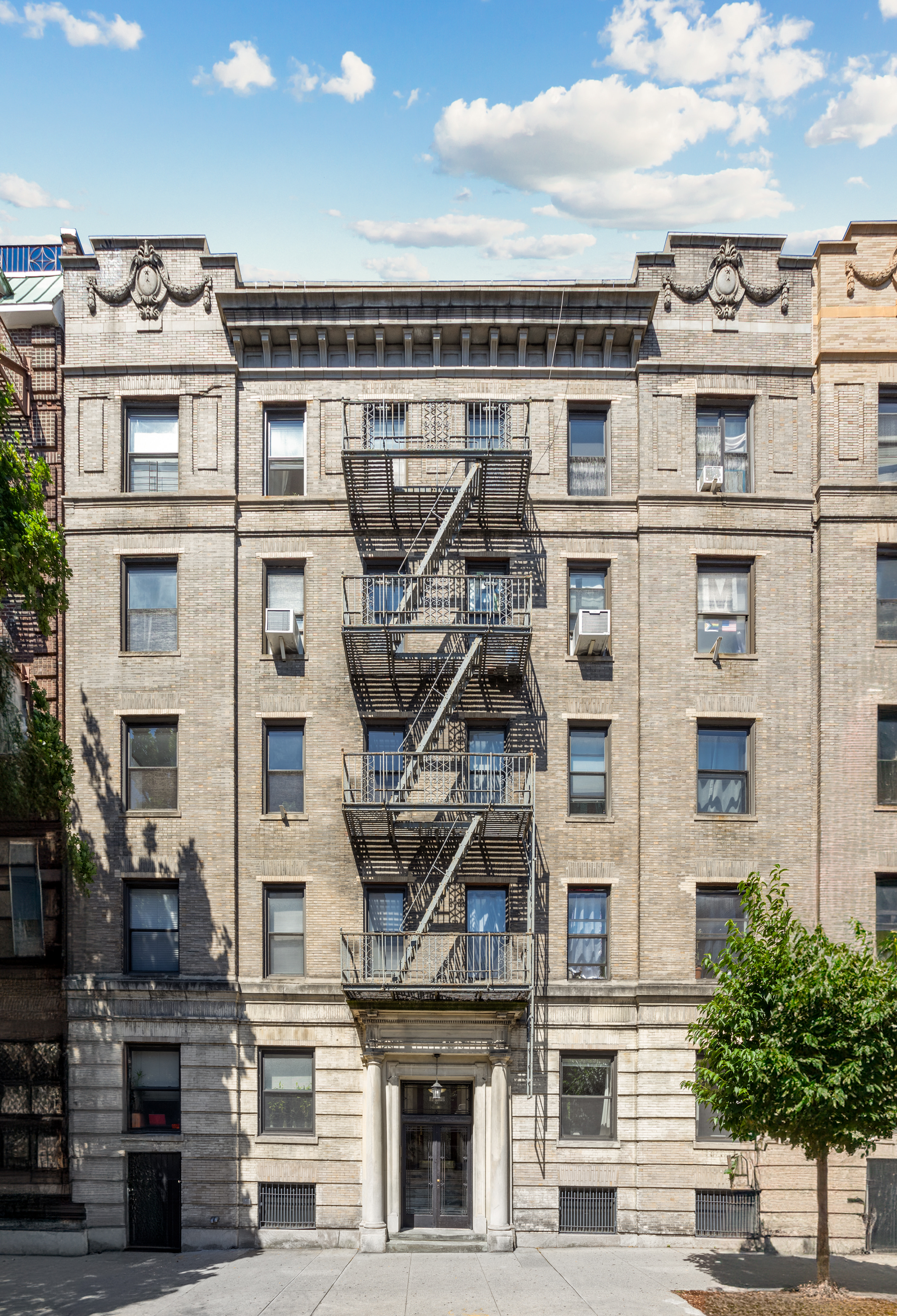 35-30 82nd Street, Unit 32 Queens, NY 11372 - Photo 10 of 11 a large building with a lot of windows
