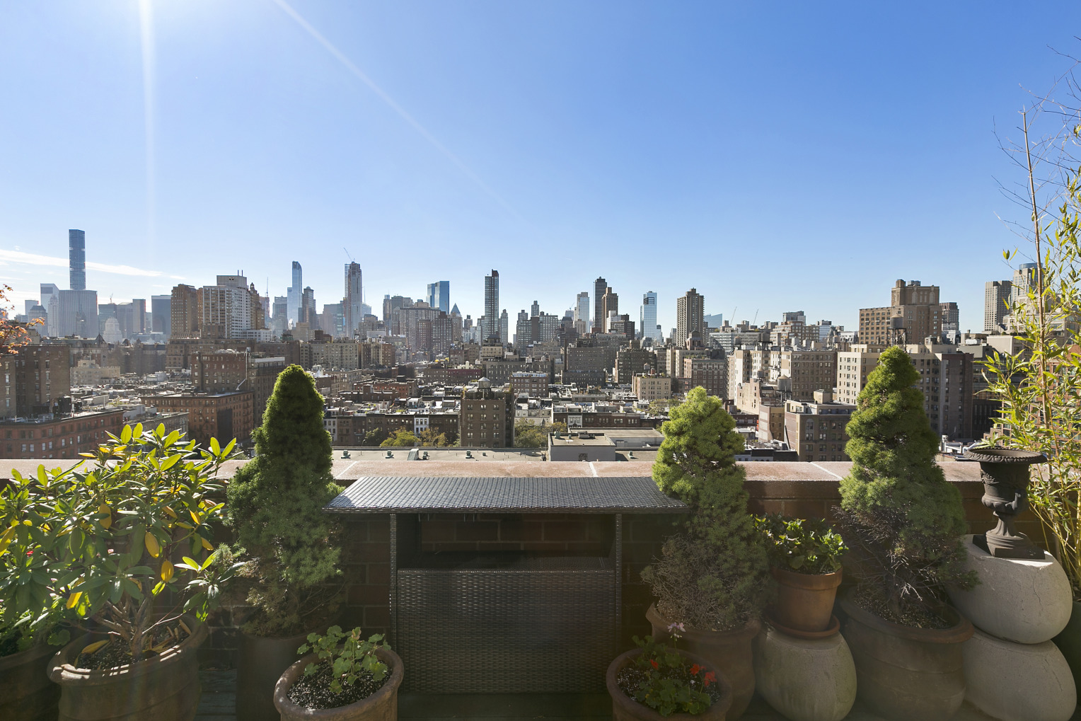 a view of a city with tall buildings