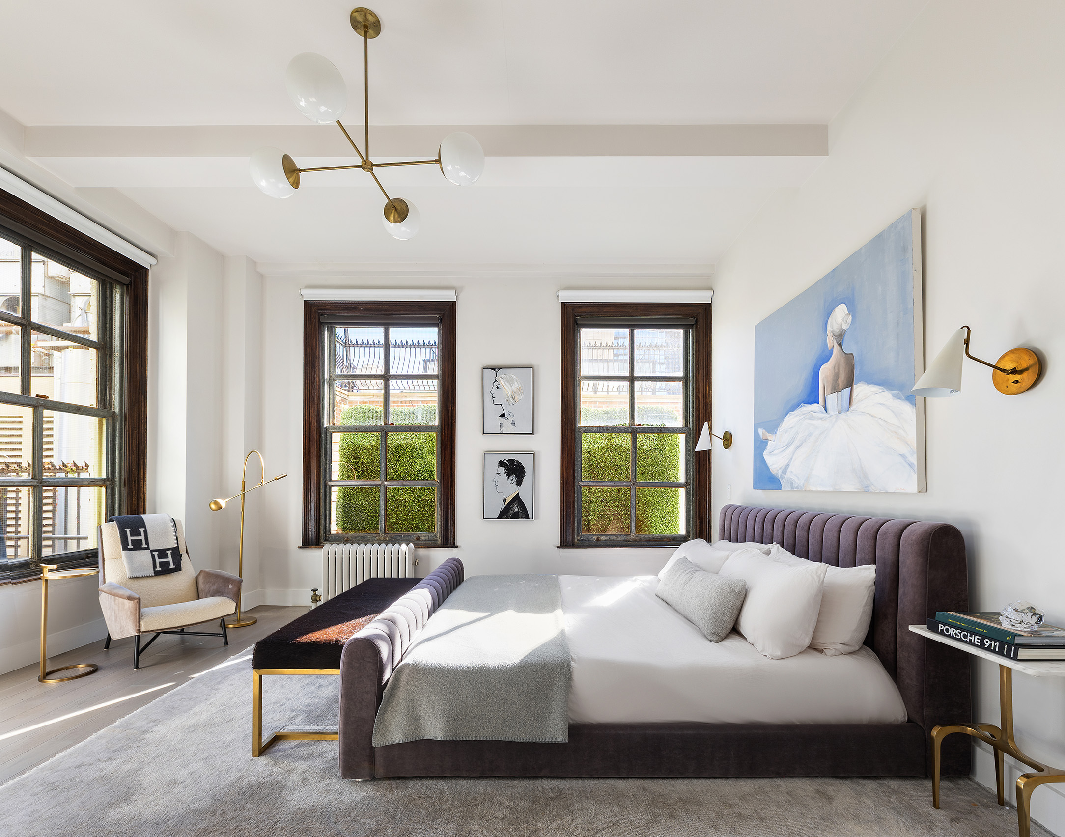 100 Hudson Street, Unit 7BC Manhattan, NY 10013 - Photo 11 of 20 a spacious bedroom with a bed and a couch