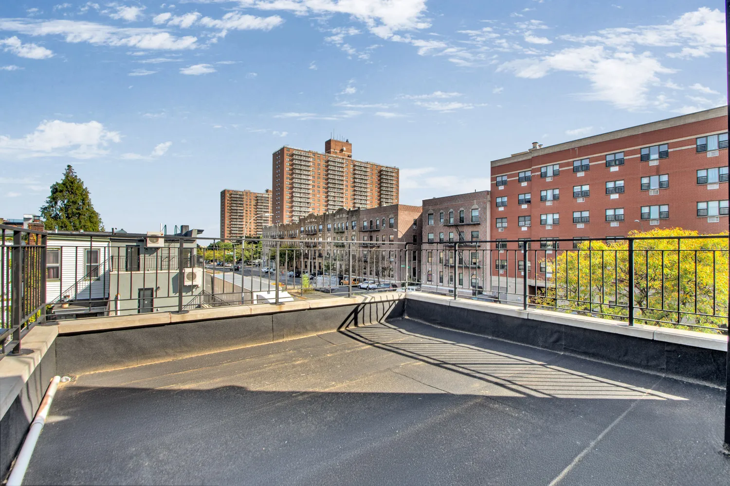 a view of city from a balcony