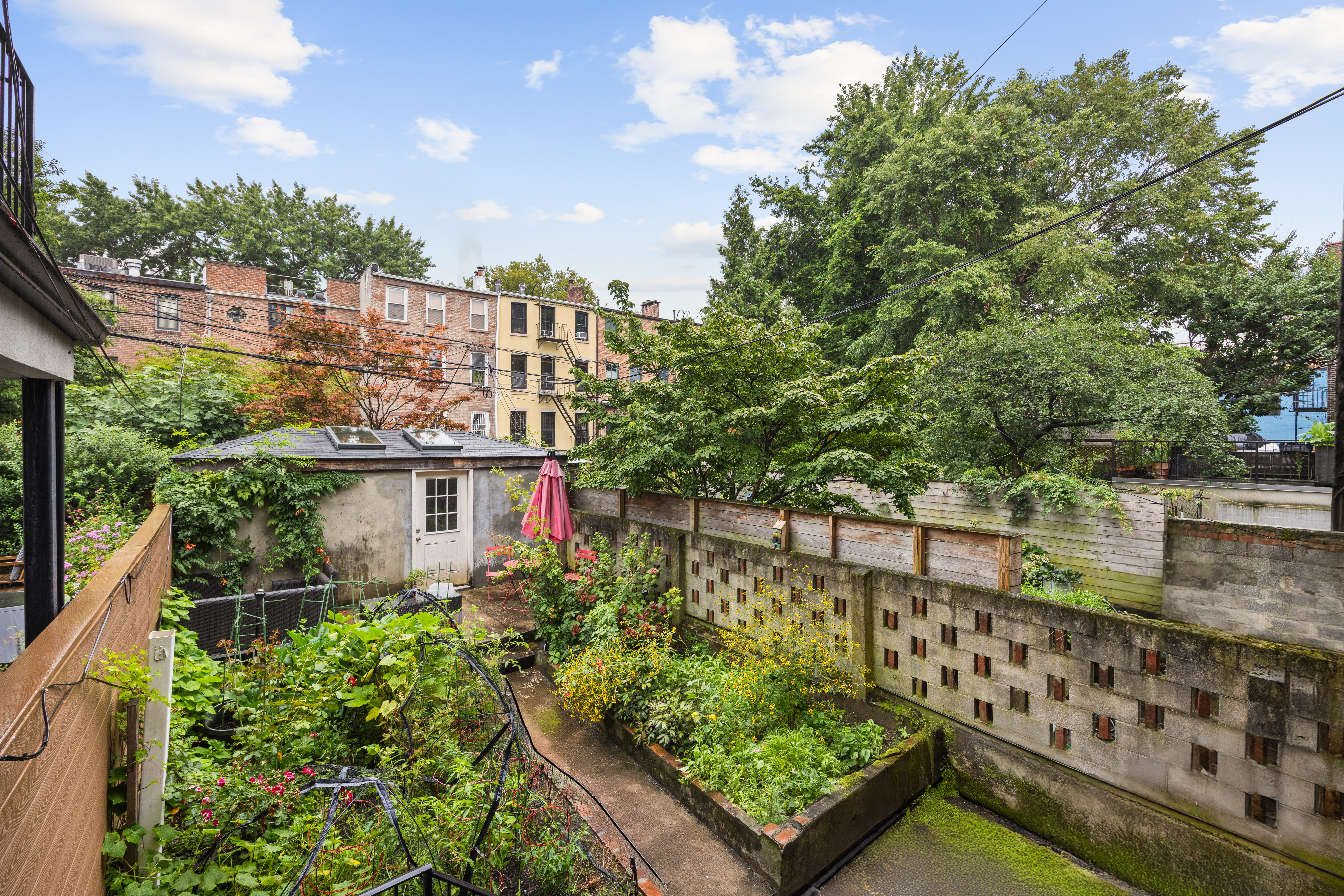 353 Warren Street Brooklyn, NY 11201 - Photo 8 of 10 a view of a garden
